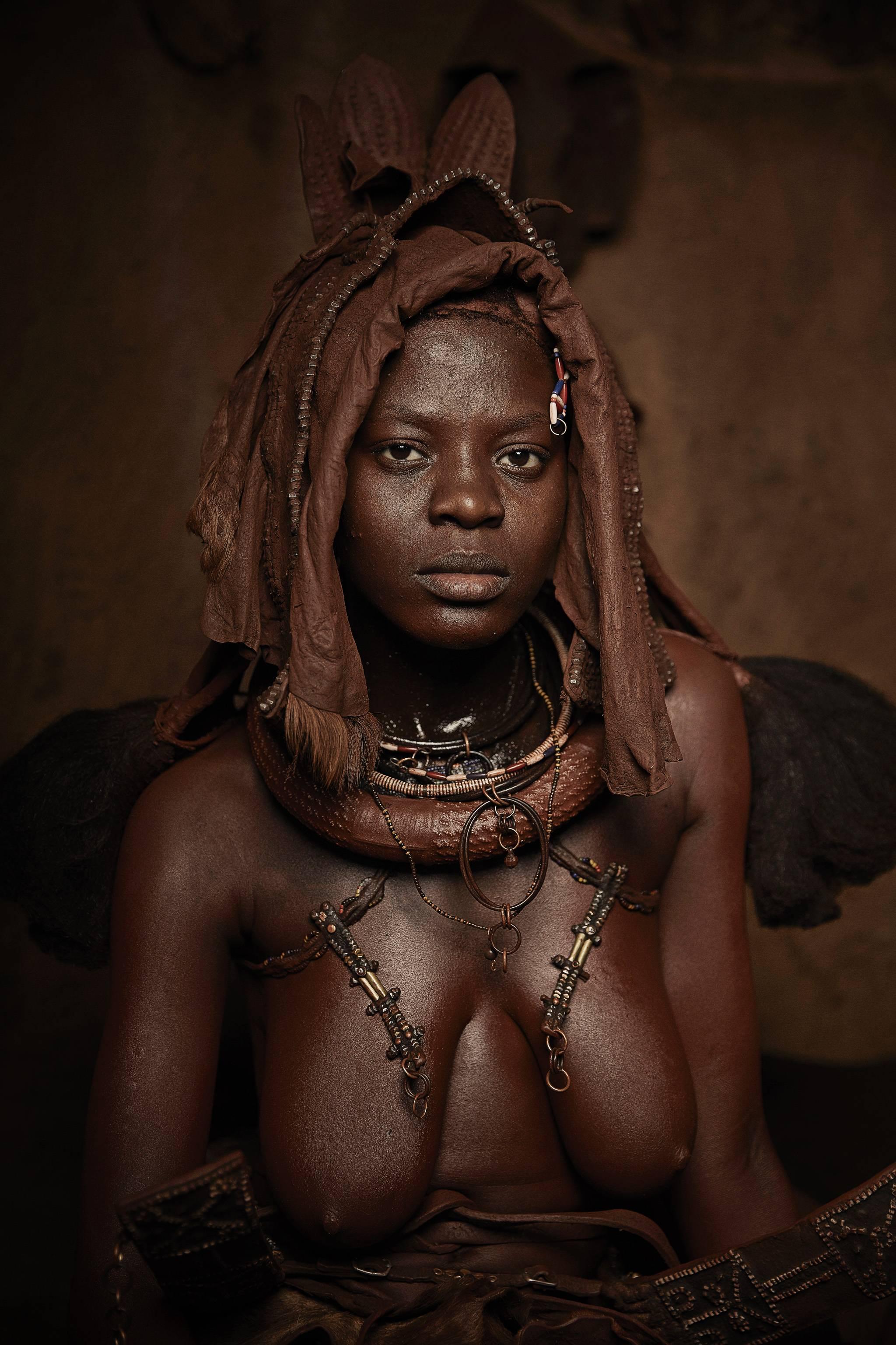 Himba Woman Epupa Falls 2, Namibia - Photograph by Chris Gordaneer