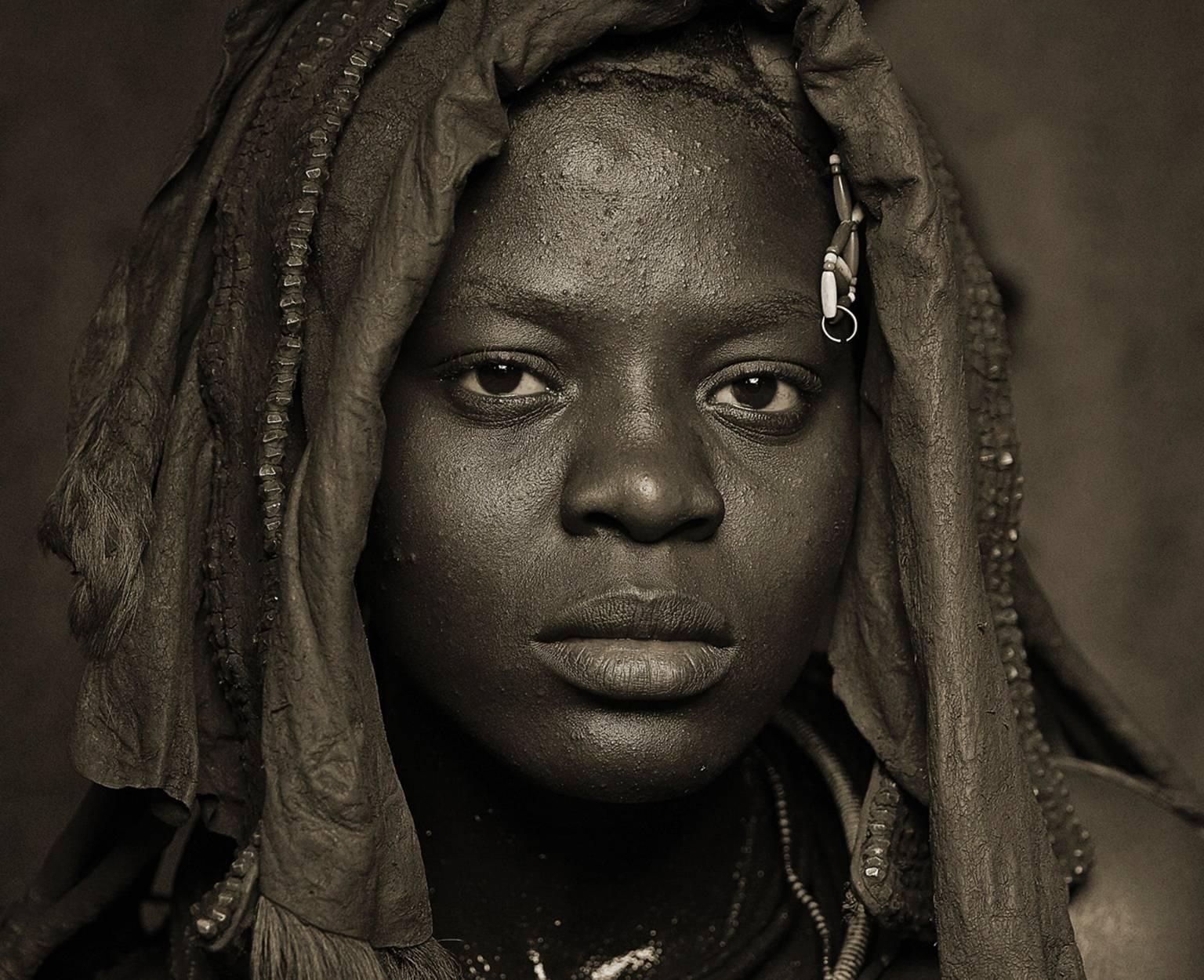 Himba Woman Epupa Falls 2, Namibia - Black Black and White Photograph by Chris Gordaneer
