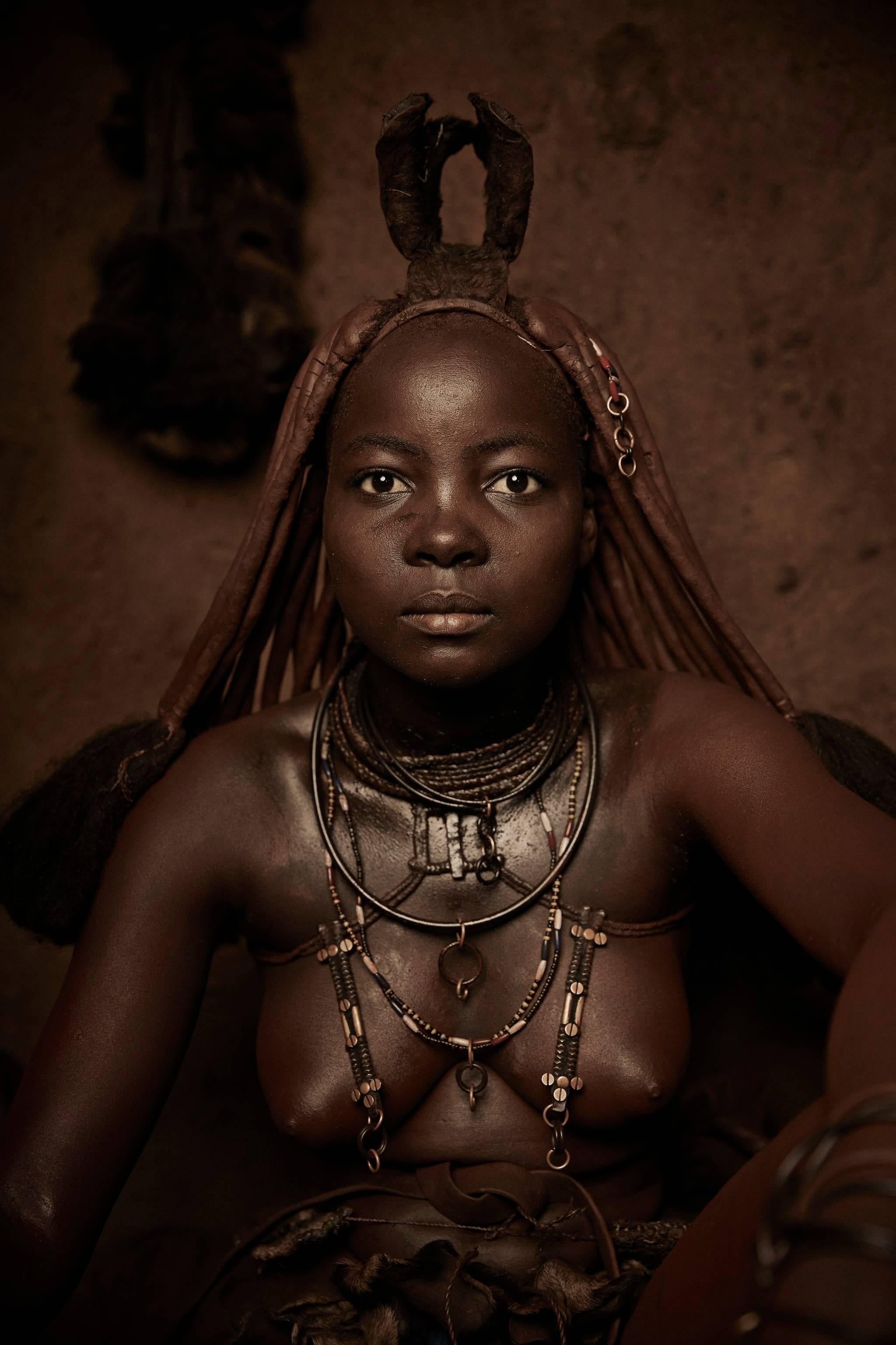 Himba Woman Epupa Falls 14 - Photograph by Chris Gordaneer