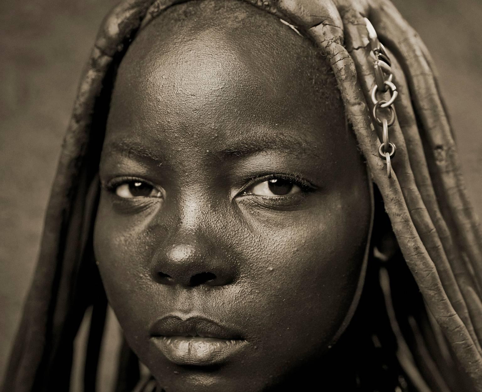 Himba Woman Epupa Falls 10 - Photograph by Chris Gordaneer