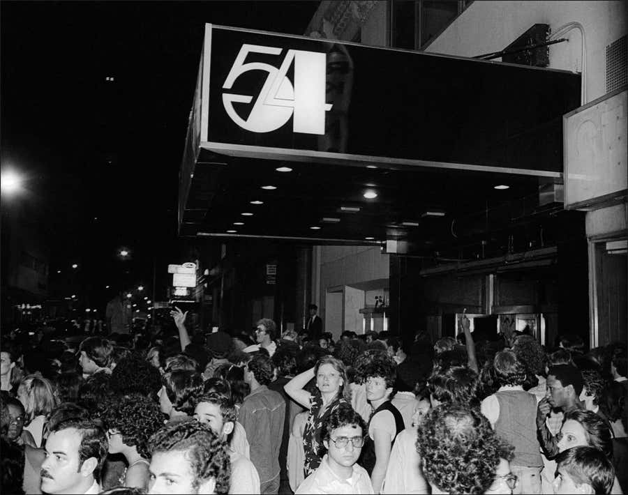 Studio 54 Logo/Crowds Photograph by Allan Tannenbaum