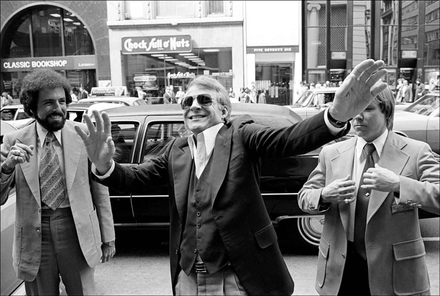 Allan Tannenbaum Black and White Photograph - Steve Martin, On Fifth Avenue, 1977
