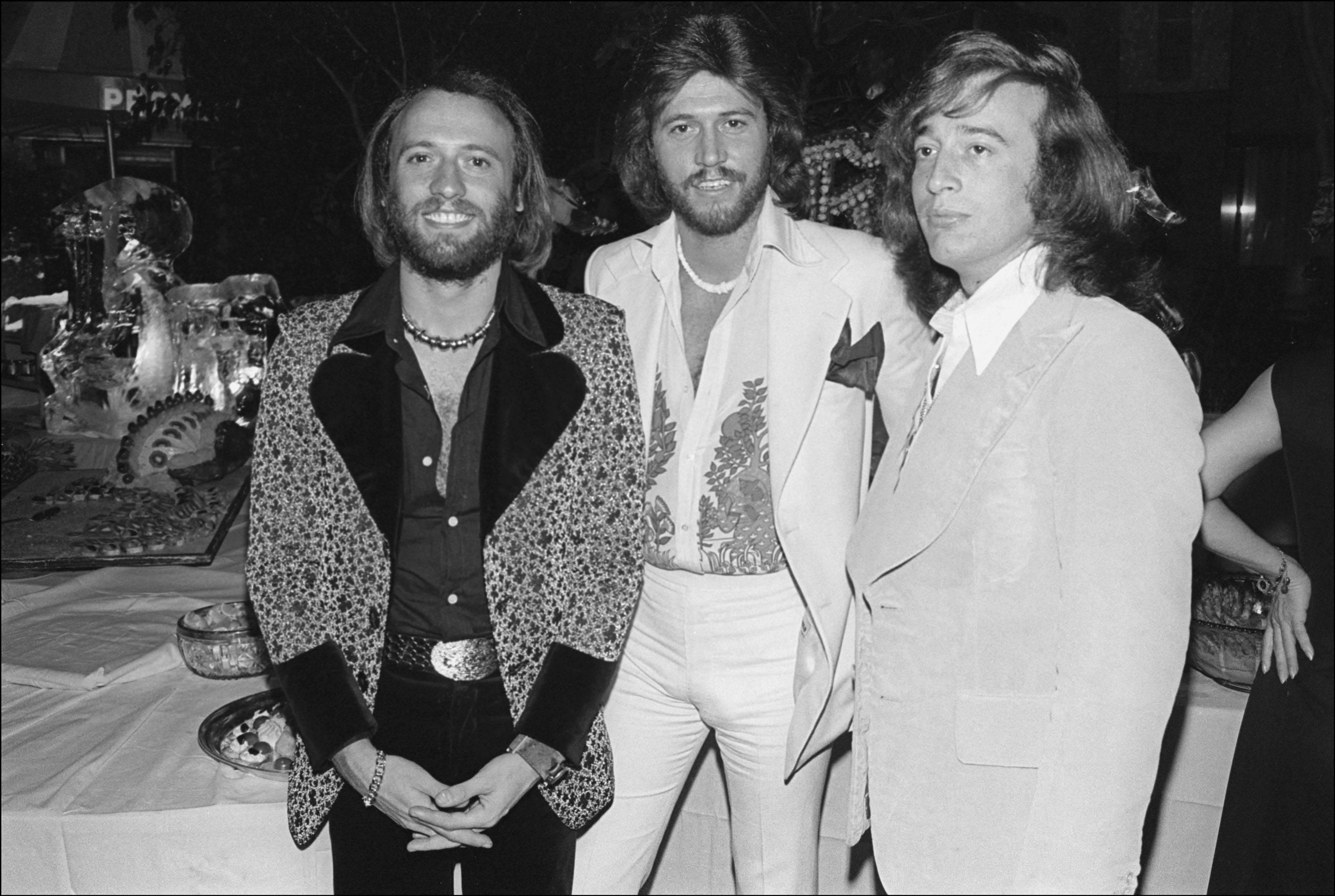 Allan Tannenbaum Black and White Photograph - The Bee Gees 20th Anniversary Party, 1975