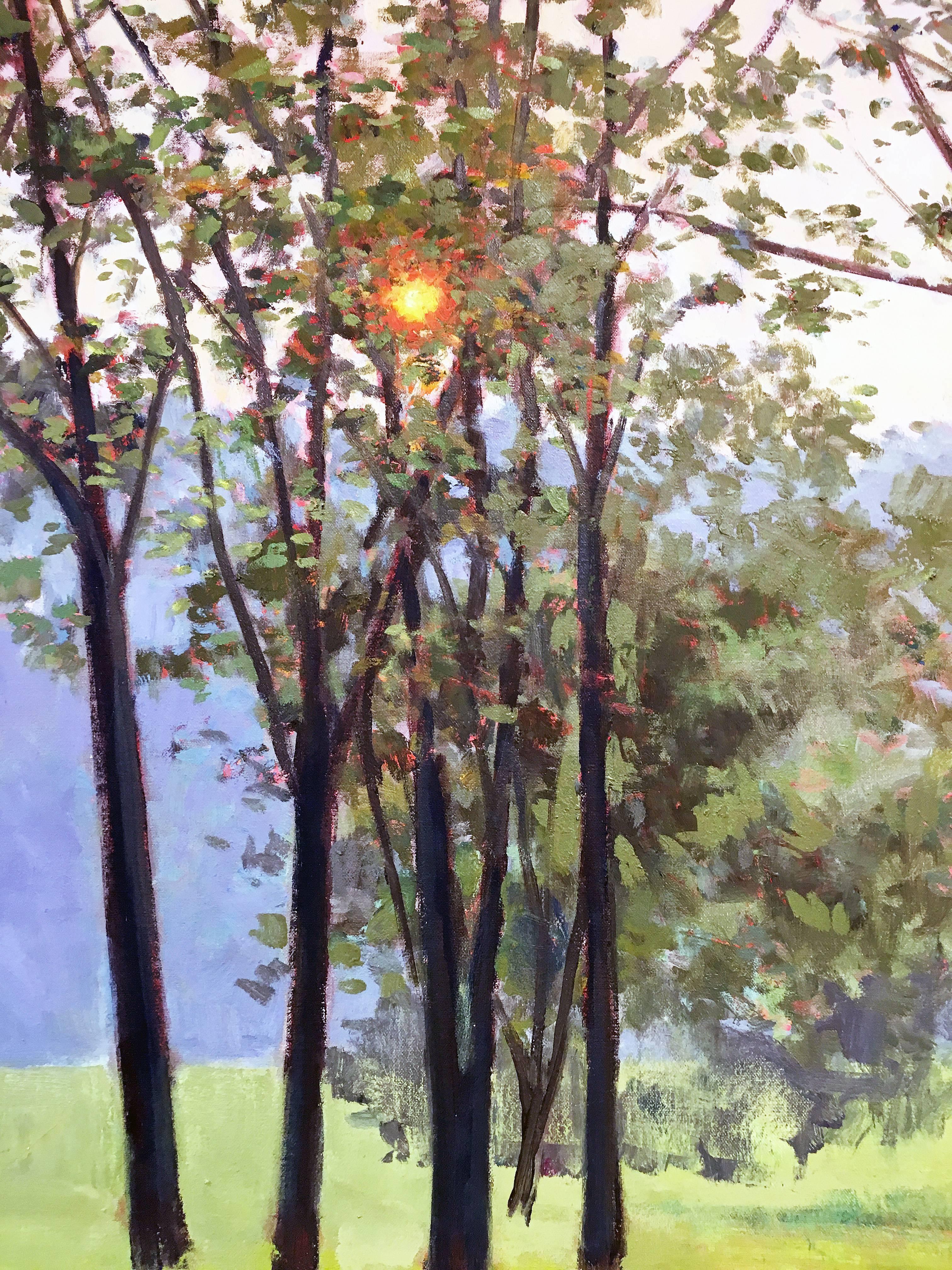 Hazy Woodstock, by Elissa Gore, 2007. Oil on canvas, 25 x 60 inches. A serene and peaceful panoramic view of a lush green field with woods in the background. In the foreground are a grove of trees where the orange sun peeps through. Rich colors of