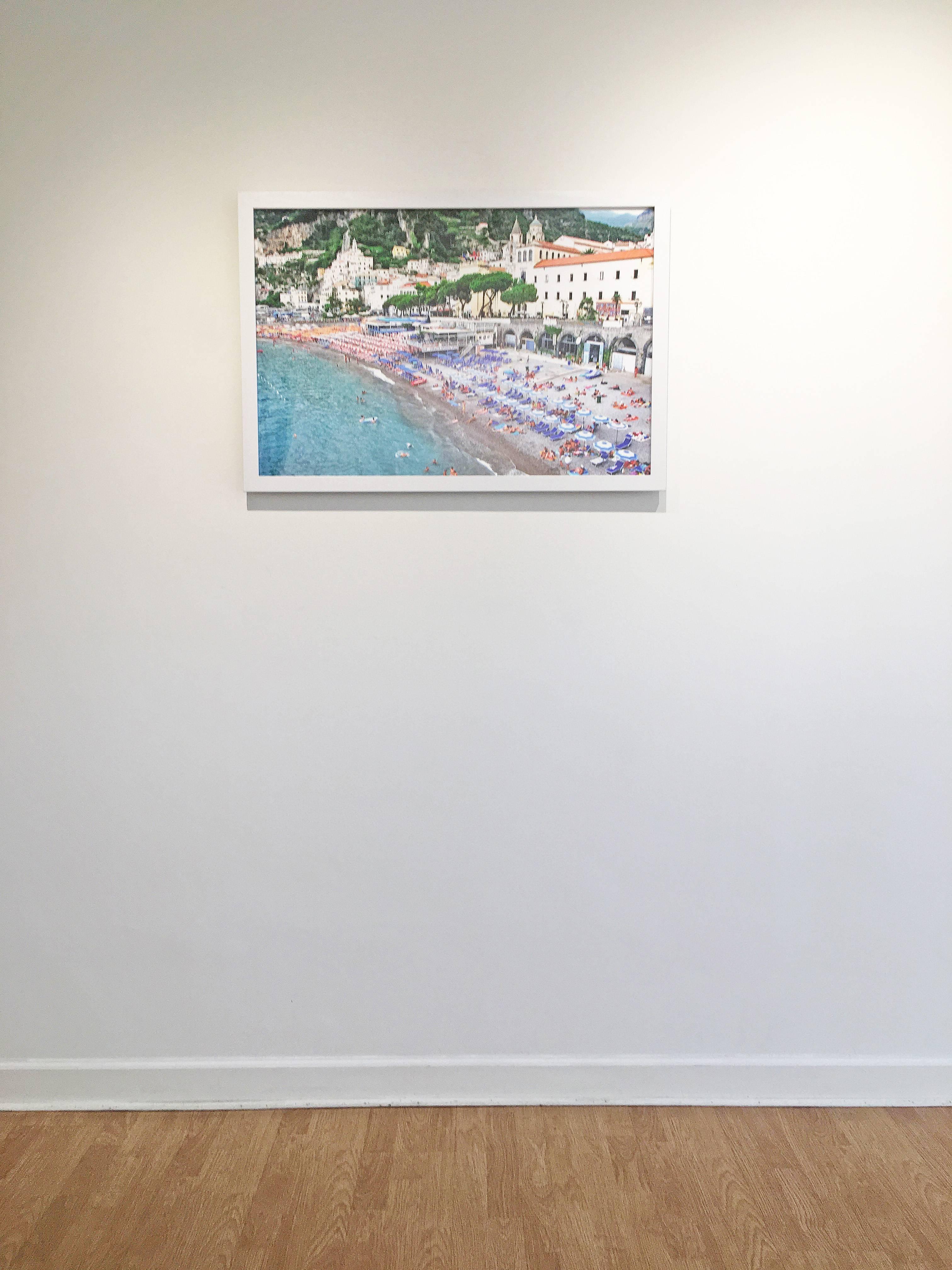 'Amalfi Coast' by DJ Leon, 2015, Ed. of 15. Archival C-print photograph of the famed Amalfi beach during the Summer months. The photograph print measures at 24 x 36 inches on a white frame at 26 x 38 in.

NY artist, DJ Leon is widely recognized for