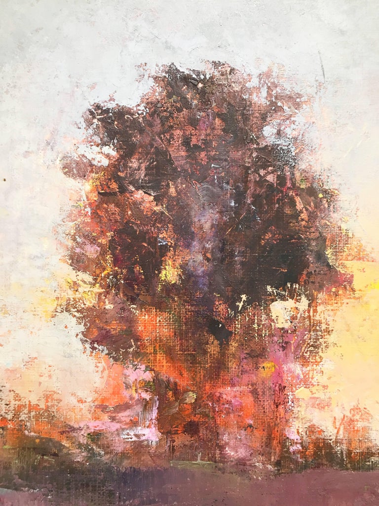 "Innis Sunset" by Elissa Gore, 2010, oil on panel, 12 x 16 inches. Red, orange and yellow are the predominant colors in this warm sunset painting featuring two trees with the burst of color between them.