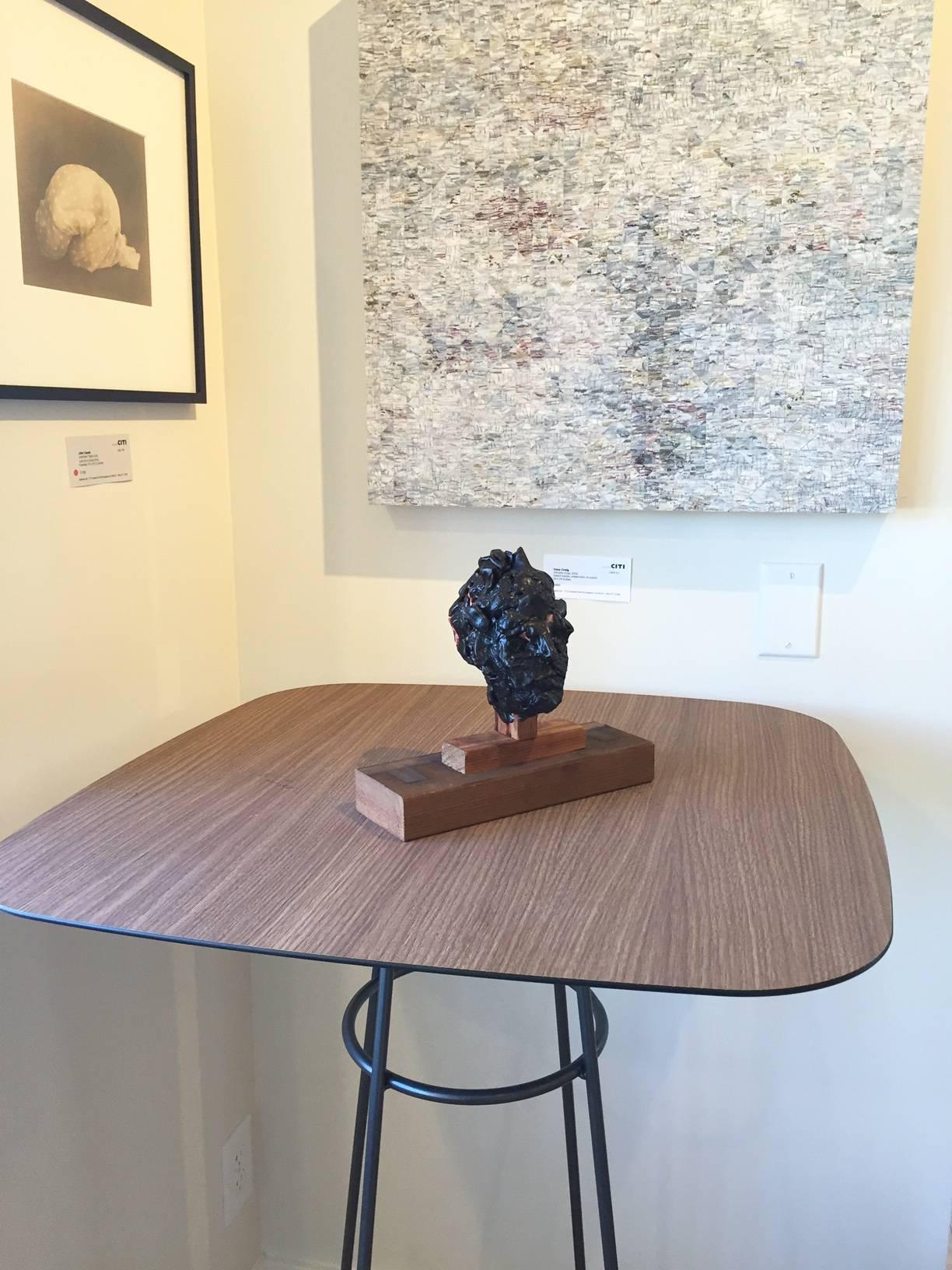 Contemporary bust from John Goodman, whose sculptures, drawings and paintings are a dichotomy of understated minimalism conveying a subtle, but evident smoldering energy. In 'Head No. 1 2014' the artist uses wax, terra-cotta, wire, and wood, to form
