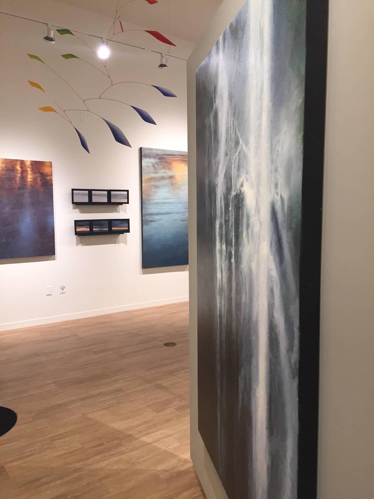 Dramatic waterfall from Gail Chase Bien, who paints thinly layered oil on linen over extended periods (from months to years) to complete a single work of art. Taking cues from nature’s extraordinary visual offerings — specifically, the play of light