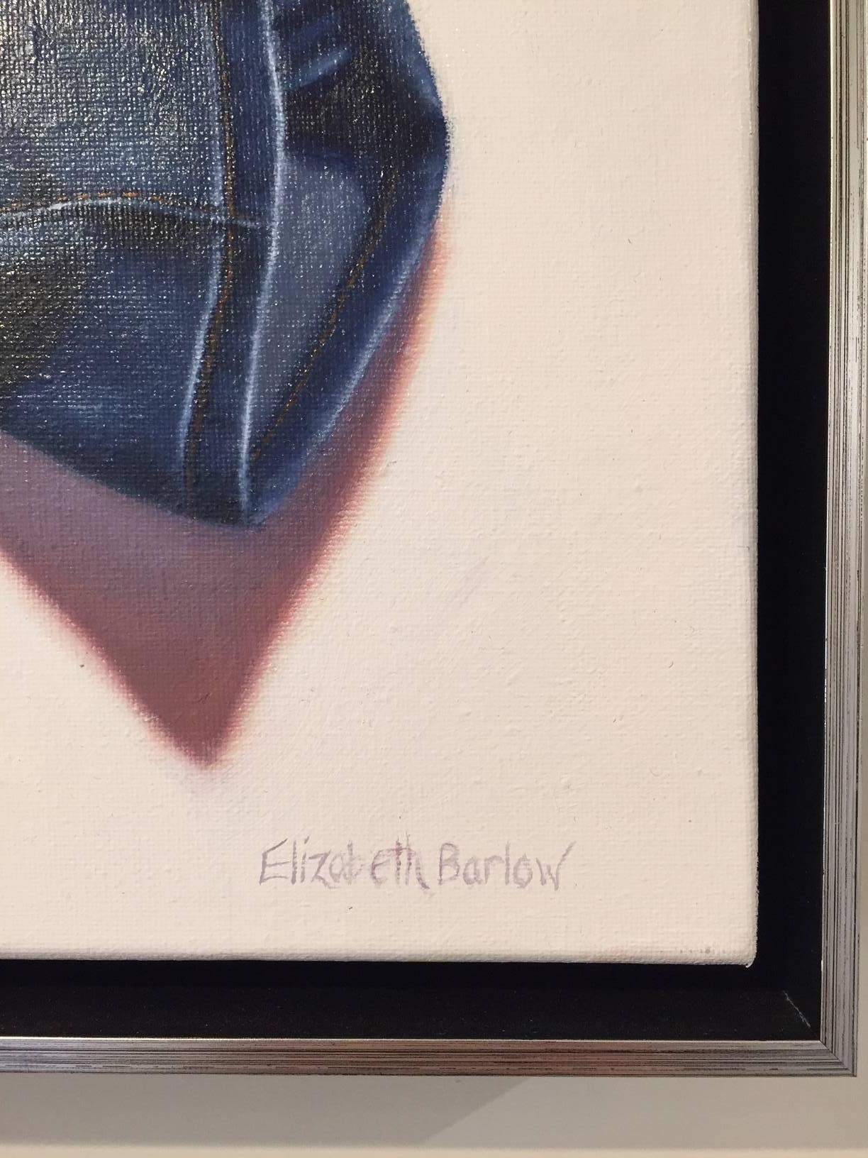 A pair of entwined blue jeans in a contemporary still life "Portrait in Absentia" are featured in this important oil painting by American artist Elizabeth Barlow, who works in the spirit of the great portraiture tradition, but deviates