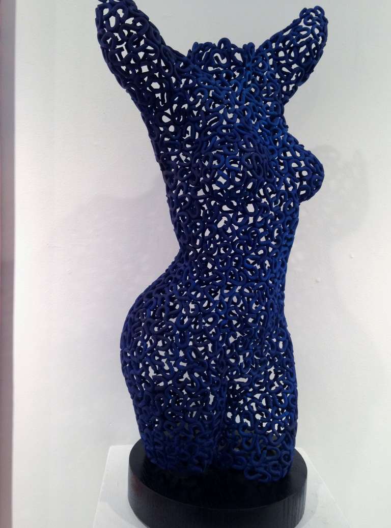 A rich blue, powered finish torso inspired by Grecian statuary