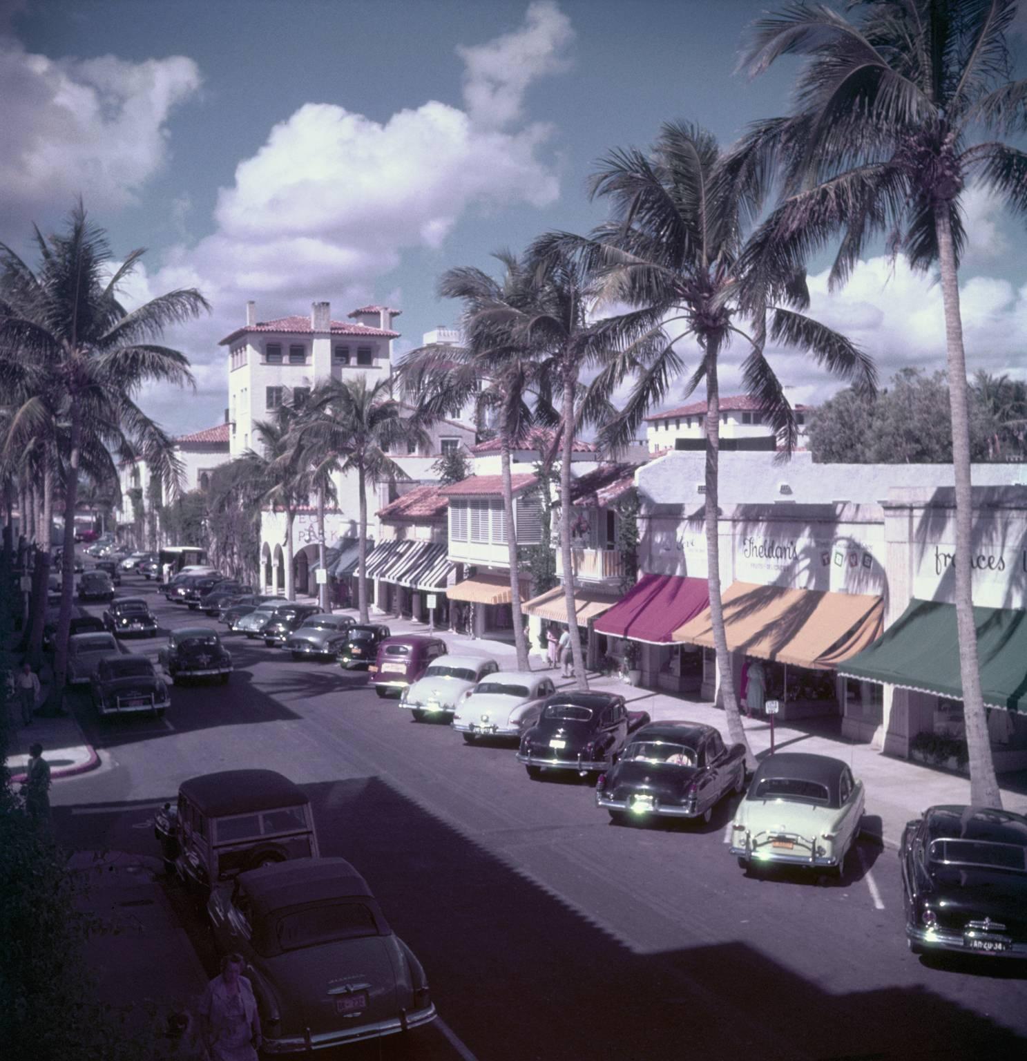 Slim Aarons Landscape Photograph - 'Palm Beach Street'  (Estate Stamped Edition)