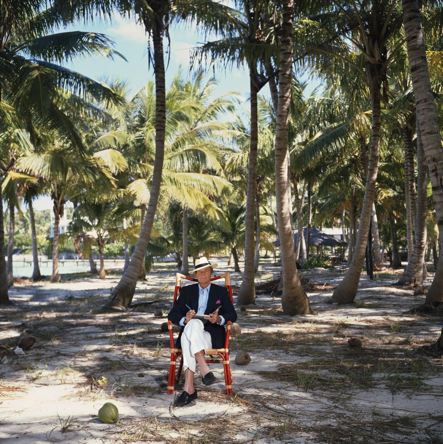 'Abaco Islander' by Slim Aarons

Author Chester Thompson at work in his coconut grove on the Abaco Islands of the Bahamas, March 1986. His ancestor Wyannie Malone settled on the islands in 1783, founding Hope Town. 

Typically 'Slim' this photograph