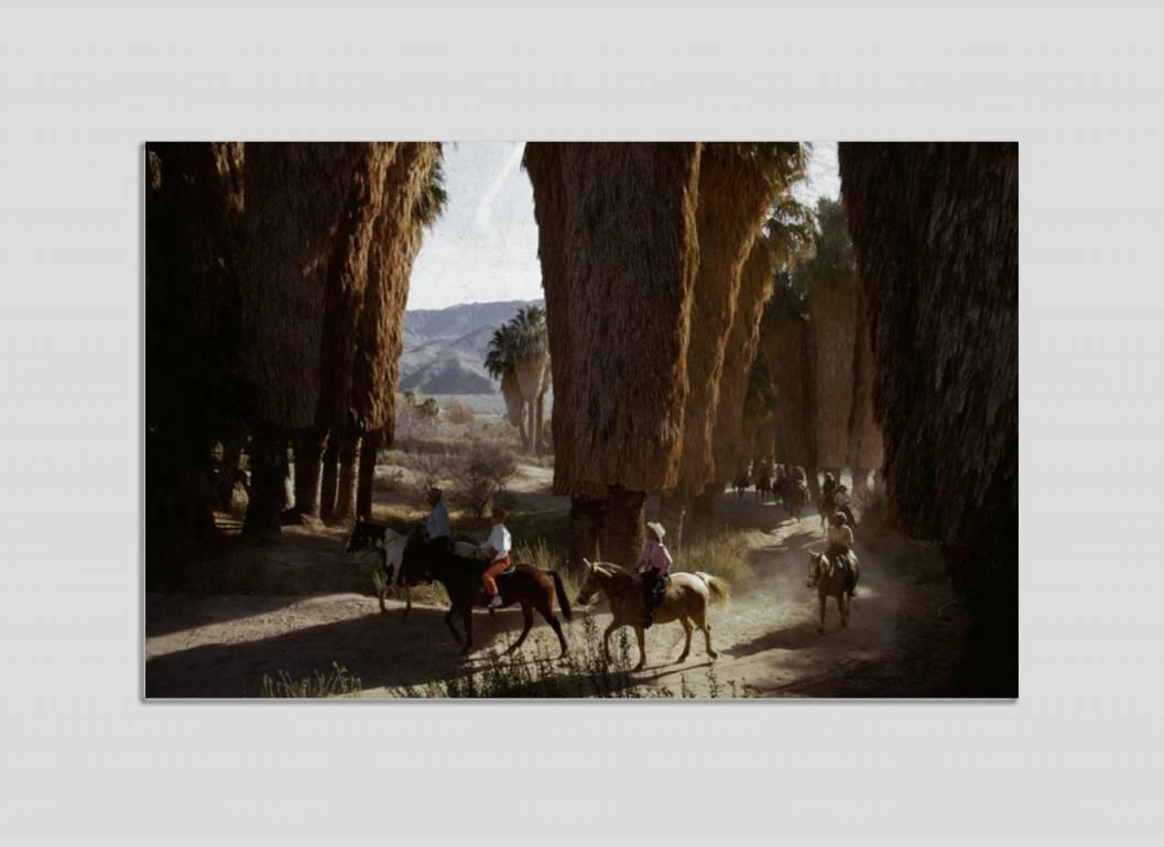 Slim Aarons Color Photograph - 'Early Riders' Palm Springs 1970 (Perspex face mounted Aluminium Dibond)