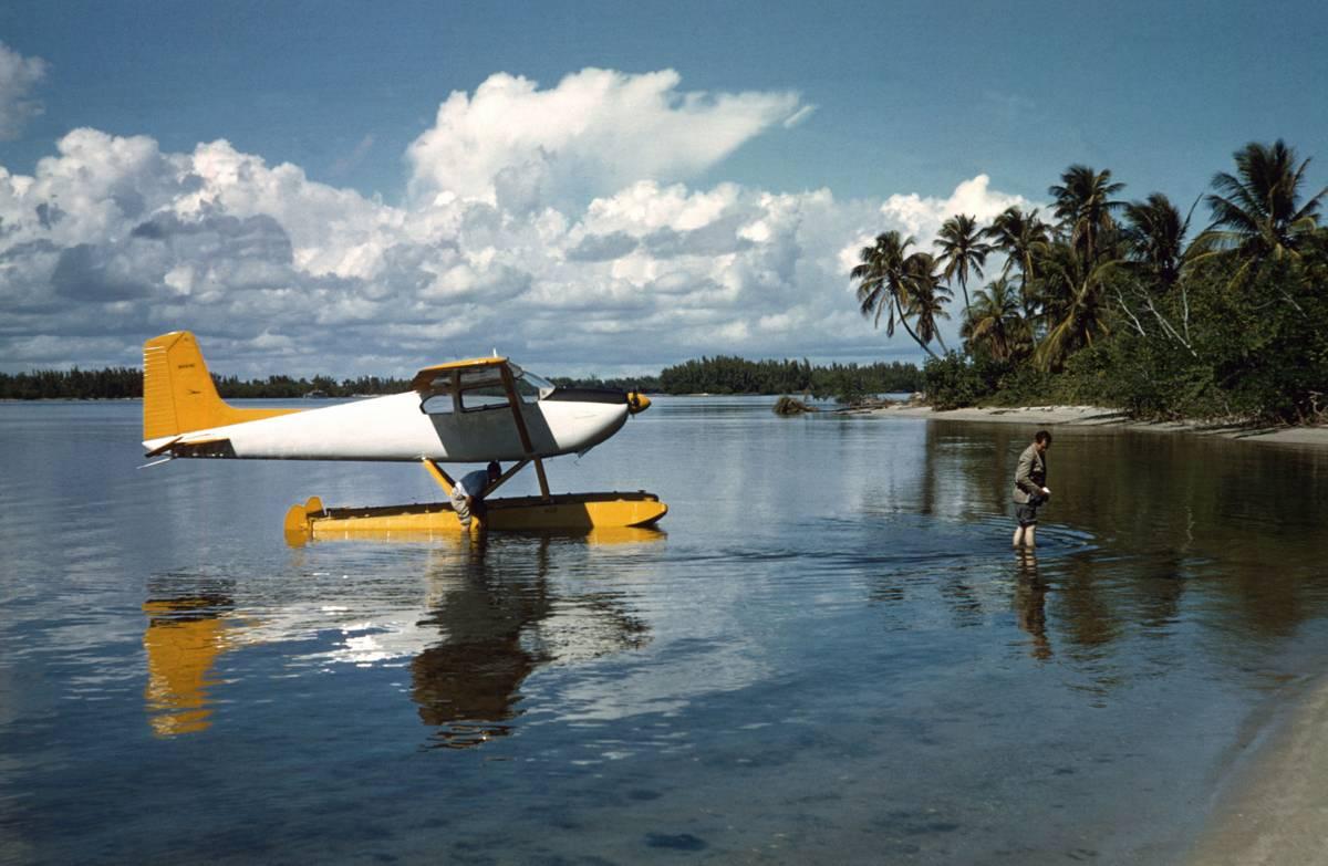 'Arriving In Style' by Slim Aarons

Mike Phipps arriving for lunch at the Guinness house in Manalapan, Palm Beach, circa 1960.

Simply fabulous! 
Mike Phipps arrives in style and can be seen wading ashore from his yellow and white coloured sea plane