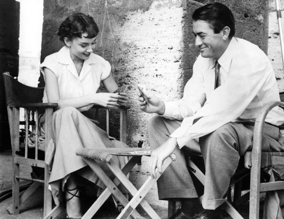 Unknown Black and White Photograph - 'Audrey Hepburn & Gregory Peck Play Cards' (Limited Edition)