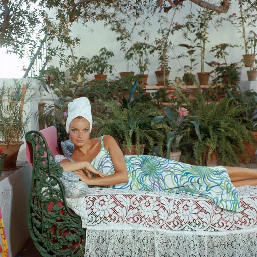 Slim Aarons Color Photograph - 'Quiet Afternoon' Marbella (Estate Stamped Edition)