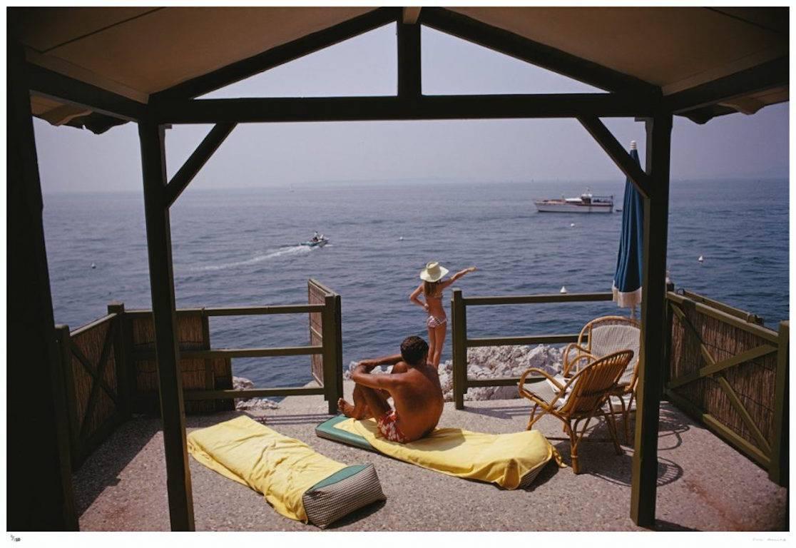 'Beach Hut In Antibes'  (Estate Stamped Edition) - Photograph by Slim Aarons