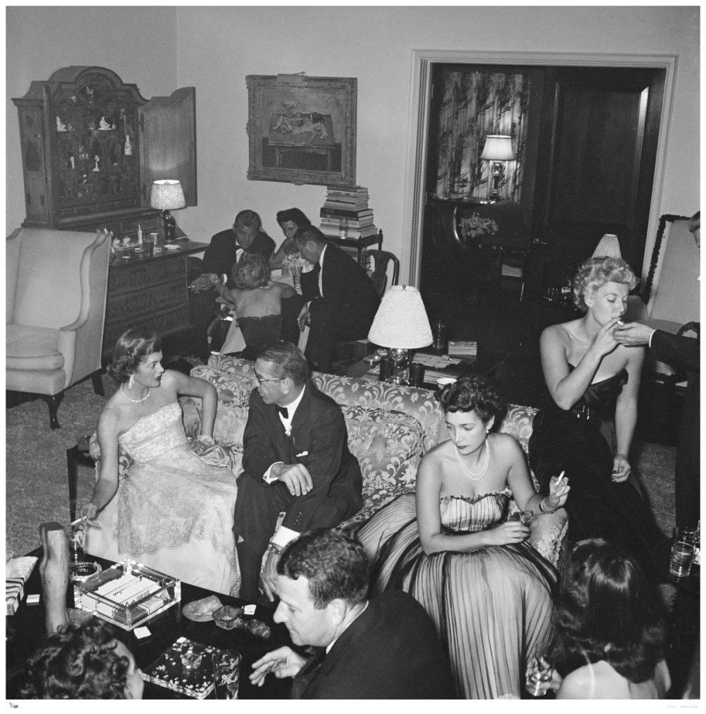 'Beverly Hills Party' by Slim Aarons

Guests at a party given by Mrs Gary Cooper (actress Veronica Cooper, aka Sandra Shaw) in Beverly Hills, California, 1952. She is on the left, seated on the couch with Mr Van Herbick and Jack Warner's daughter.