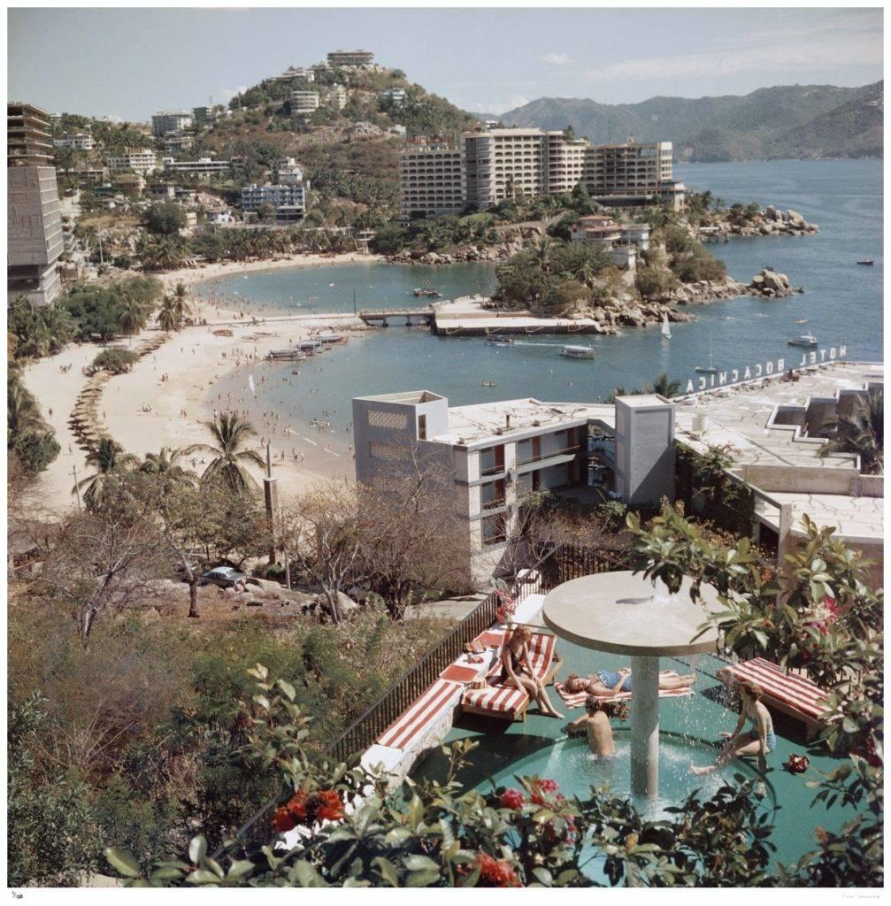 'Caleta Beach, Acapulco' (Estate Stamped Edition) - Photograph by Slim Aarons