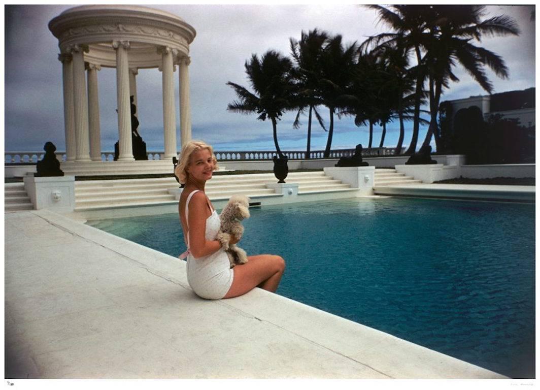 'CZ By The Pool' Palm Beach (Estate Stamped Edition) - Photograph by Slim Aarons