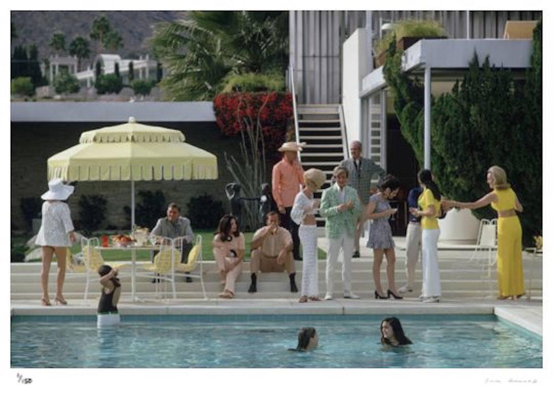 'Kaufmann Desert House' by Slim Aarons

The Kaufmann Desert House in Palm Springs, California, designed by Richard Neutra in 1946 for businessman Edgar J. Kaufmann and now owned by Nelda Linsk (right, in yellow). Lita Baron and Helen Dzo Dzo are