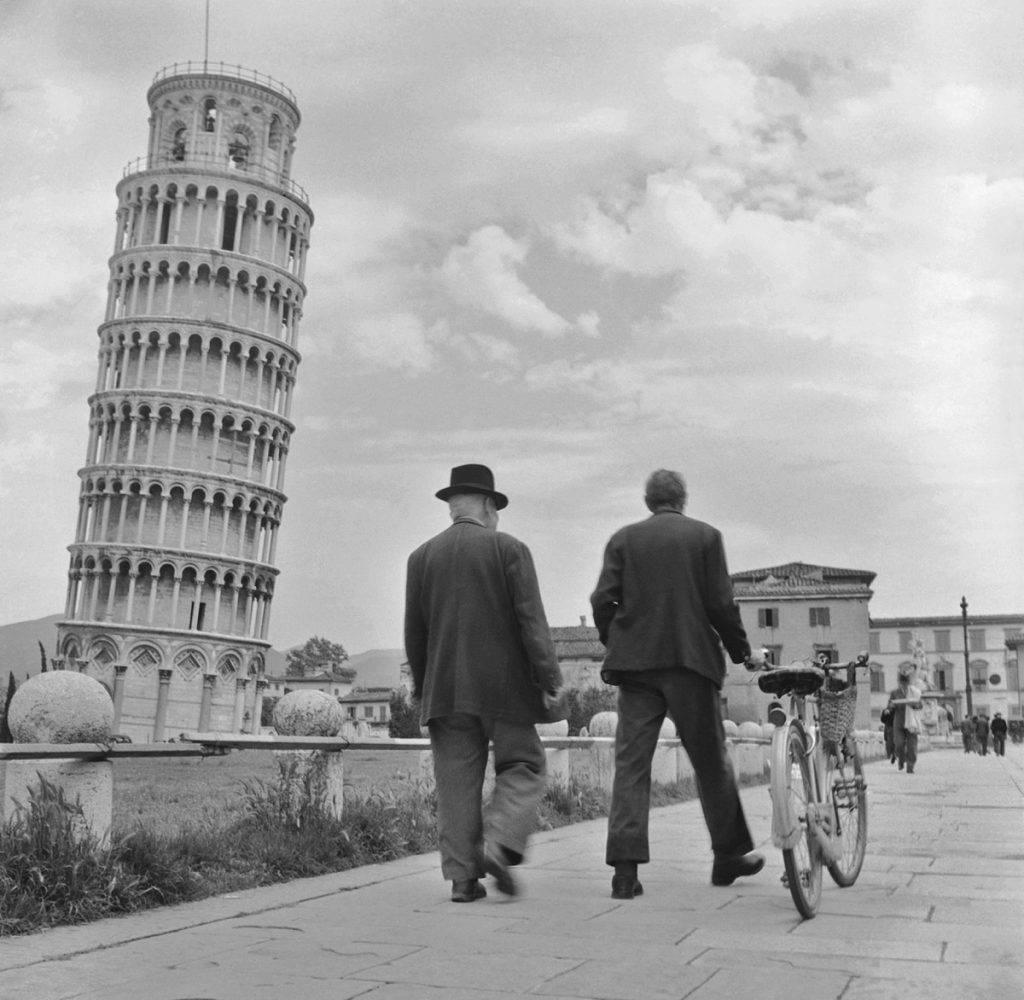 Slim Aarons Black and White Photograph - 'Leaning Tower of Pisa' Italy (Estate Stamped Edition)