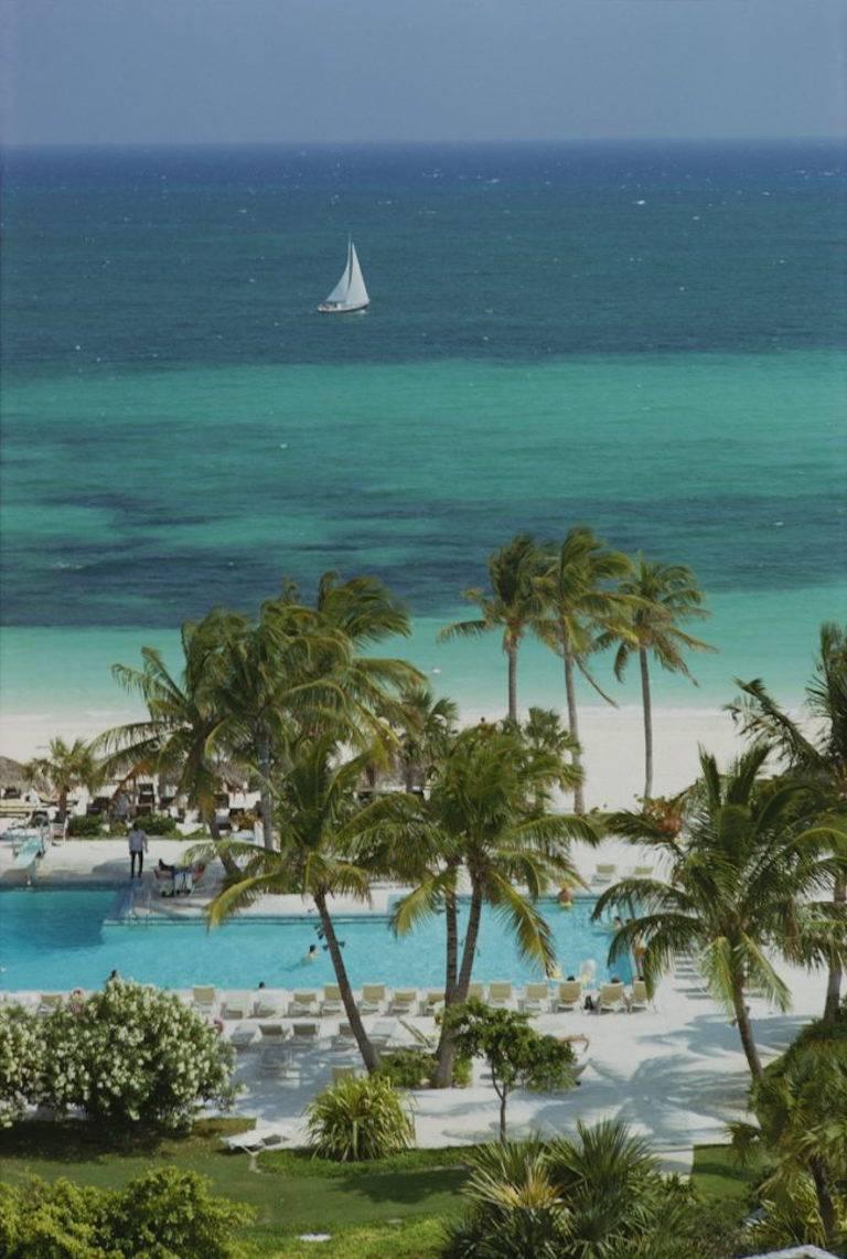 Slim Aarons Landscape Photograph - 'Freeport Beach' Bahamas (Estate Stamped Edition)