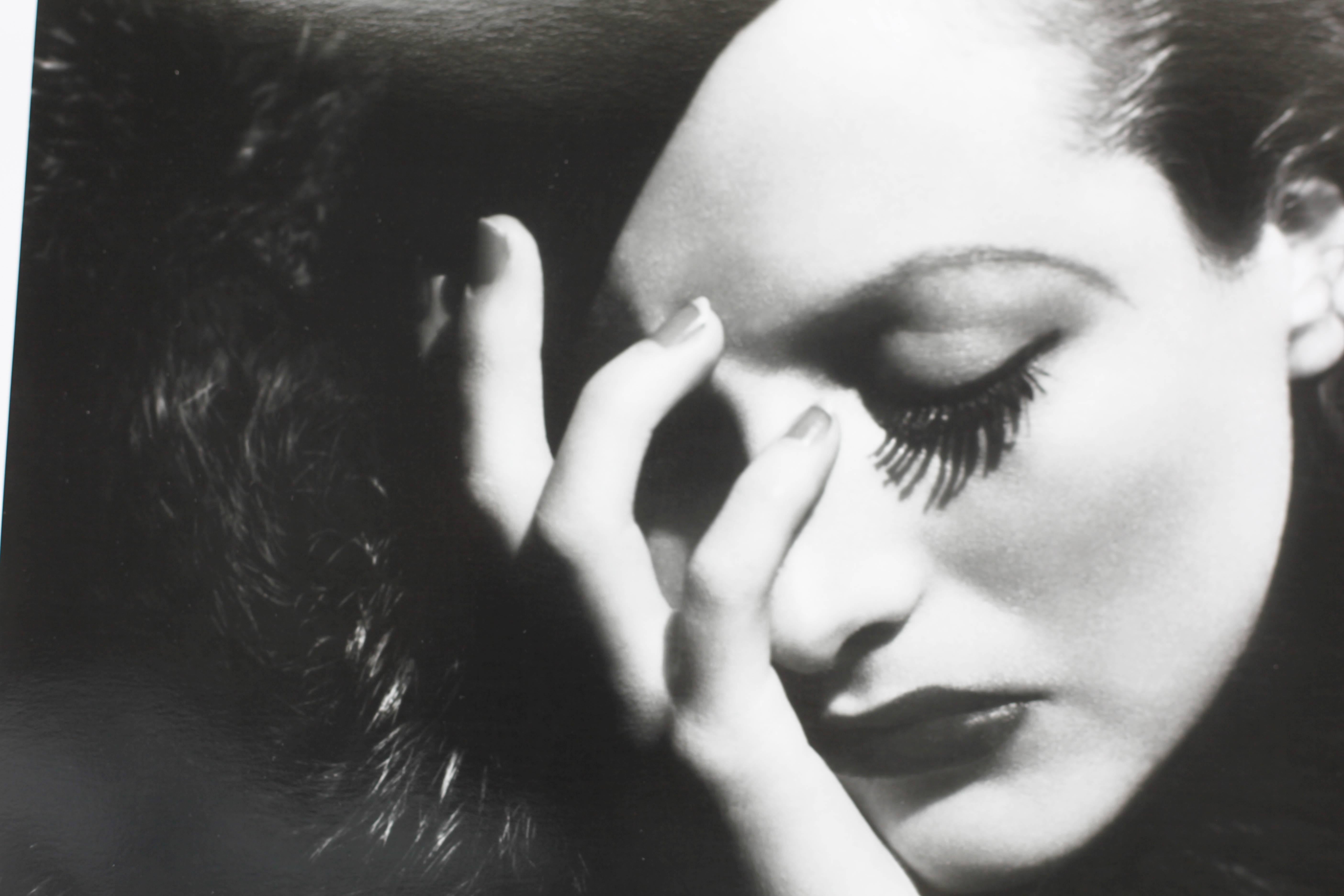 'Crawford Dramatic Eyes' by George Hurrell

A stunning portrait of the iconic movie star Joan Crawford, 1935. 

The beautiful actress's face is pictured emerging from the dramatcic darl background. The opulence, elegance and sense of the