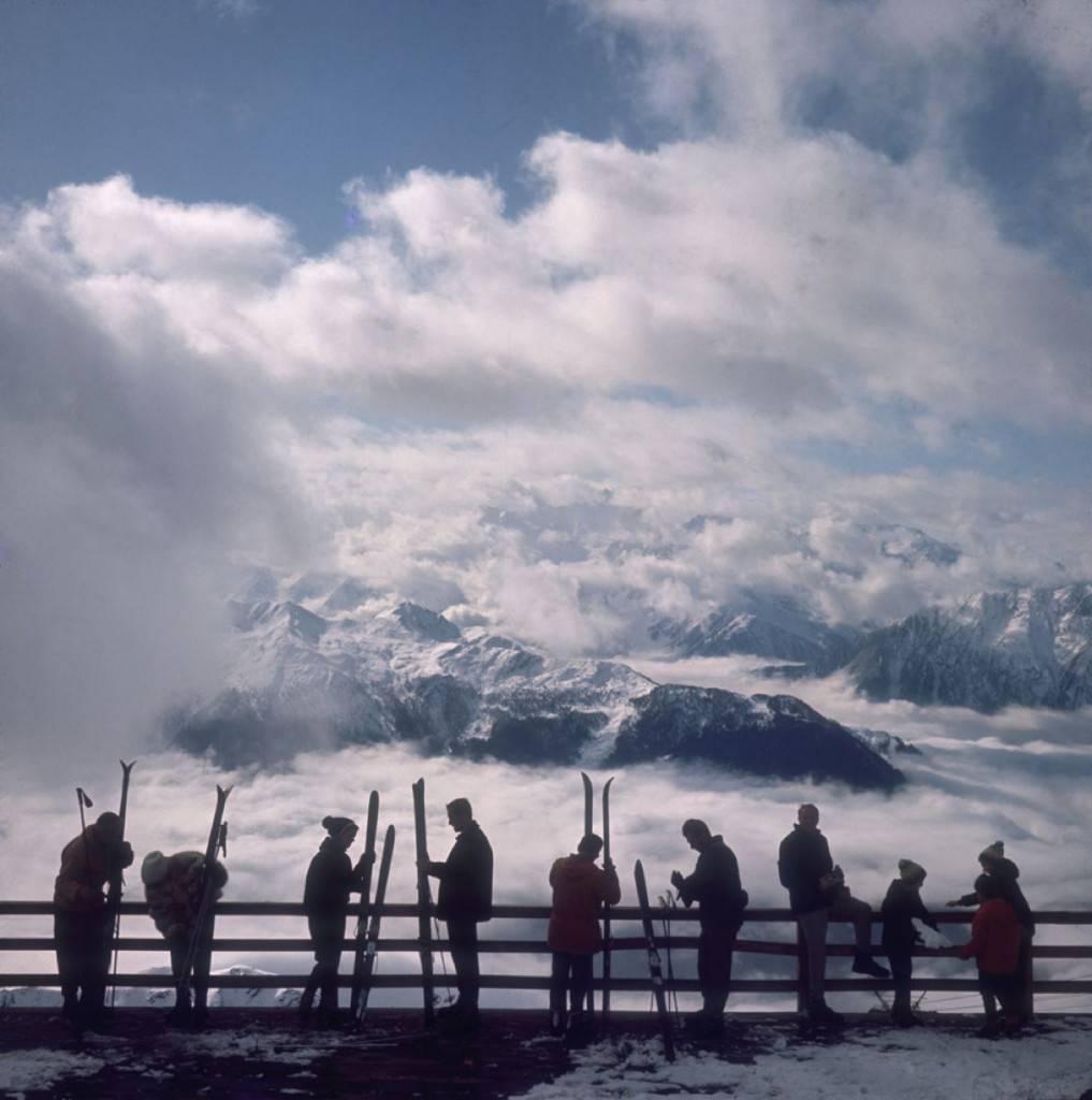 'Verbier View' by Slim Aarons

Skiers admire the view across a valley of clouds at Verbier, 1964. 

This photograph epitomises the travel style and glamour of the period's wealthy and famous, beautifully documented by Aarons.

In his words, he loved