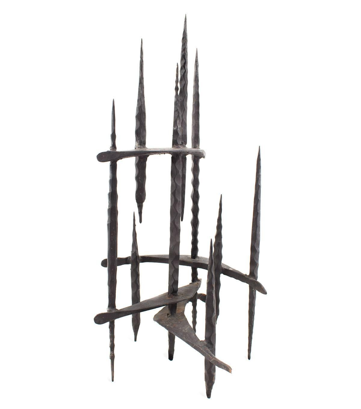 Hand Forged Iron Candelabra 
Holocaust Memorial Judaic Menorah Sculpture


David Palombo was an Israeli sculptor and painter. He was born in Turkey to a traditional family and immigrated to the Land of Israel with his parents in 1923. They lived in