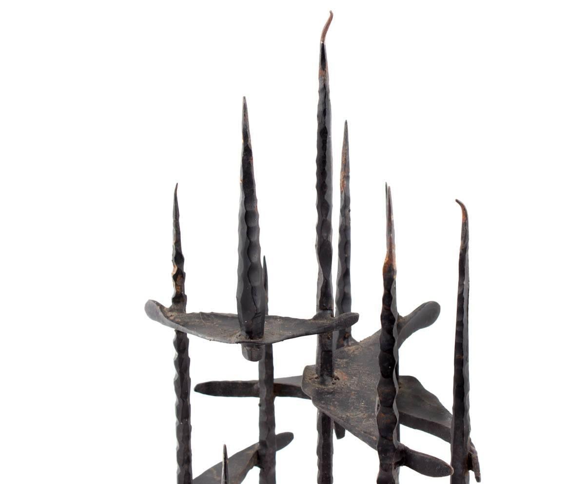 Hand Forged Iron Candelabra 
Holocaust Memorial Judaic Menorah Sculpture


David Palombo was an Israeli sculptor and painter. He was born in Turkey and immigrated to the Land of Israel with his parents in 1923. In 1940 he began his studies at