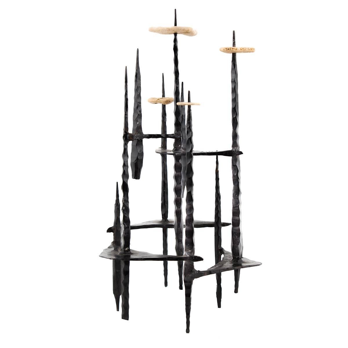 Hand Forged Iron and Drilled Stone Candelabra 
Holocaust Memorial Judaic Menorah Sculpture


David Palombo was an Israeli sculptor and painter. He was born in Turkey to a traditional family and immigrated to the Land of Israel with his parents in
