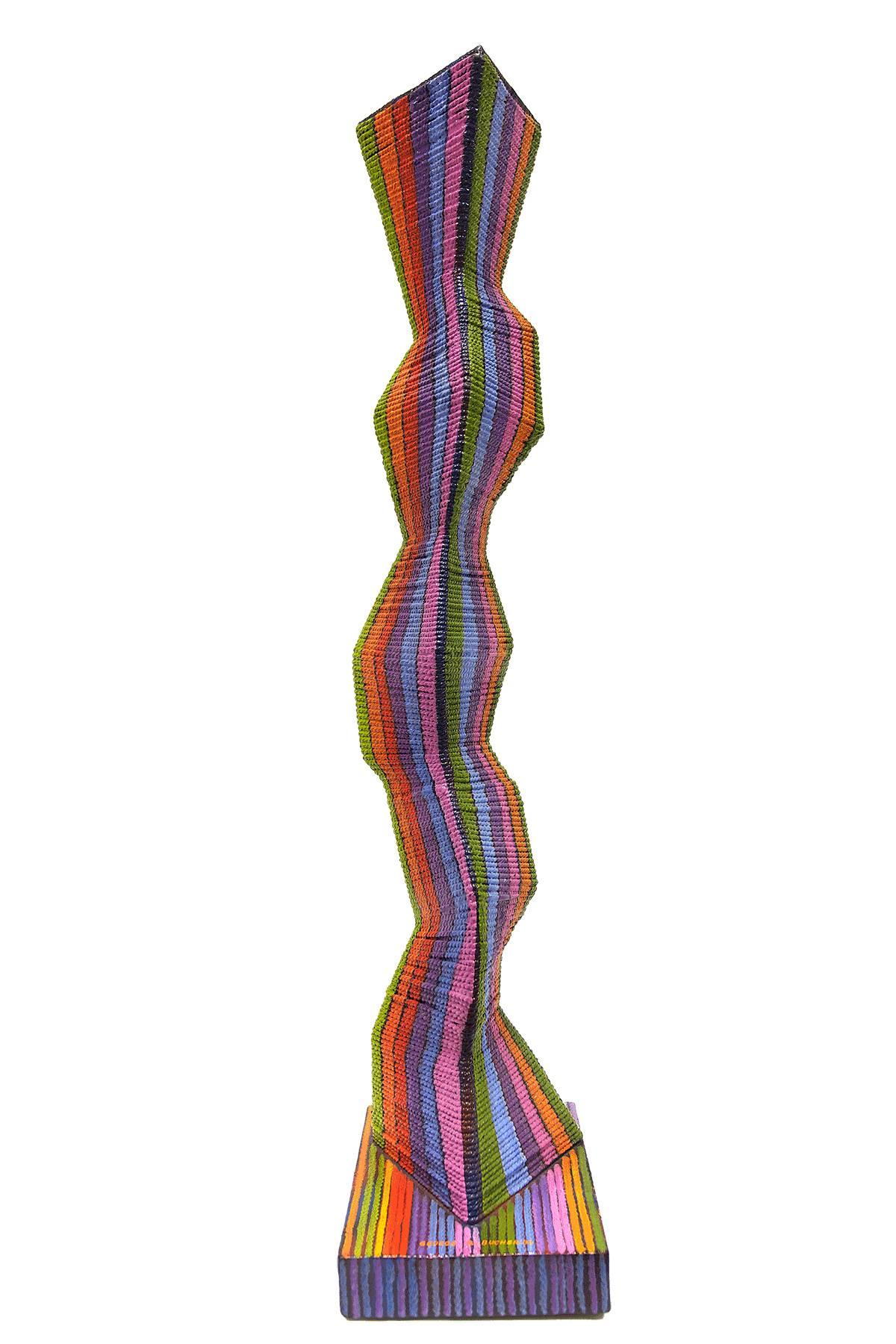 The artist George R. Bucher wraps twine around geometric, voluminous shapes to create a totem-like structure. After this Bucher painted the surface with vivid colors in an orderly manner.

Philadelphia artist George R. Bucher  1931-2015. Bucher was