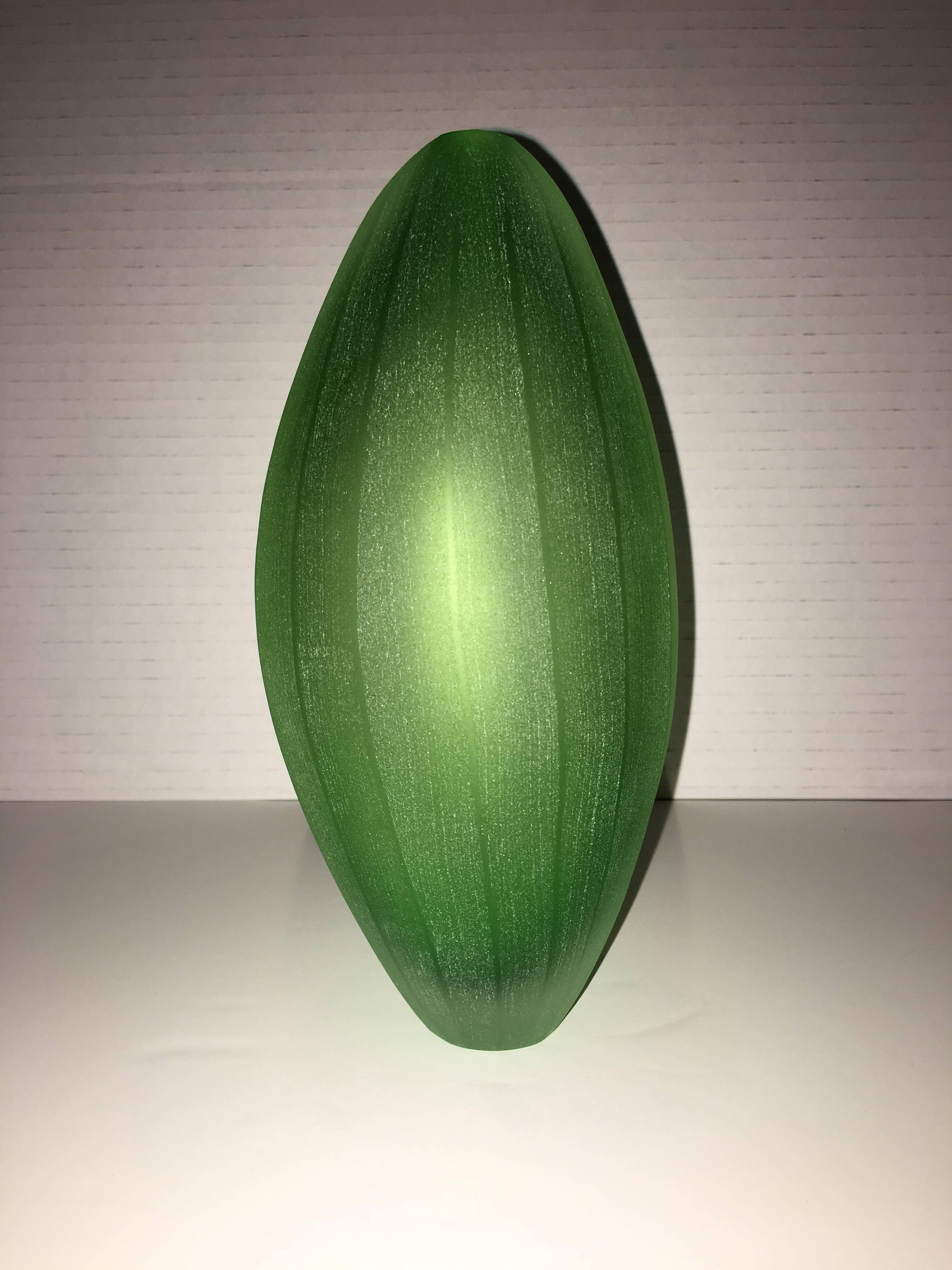 Vase designed by Laura de Santillana in edition for Arcade, 2001. this is from a series of tropical fruit and plant form inspired vases with the same matte, hand engraved, finish:
PAPAIA, made in three different shades of green. MANGO, made in dark