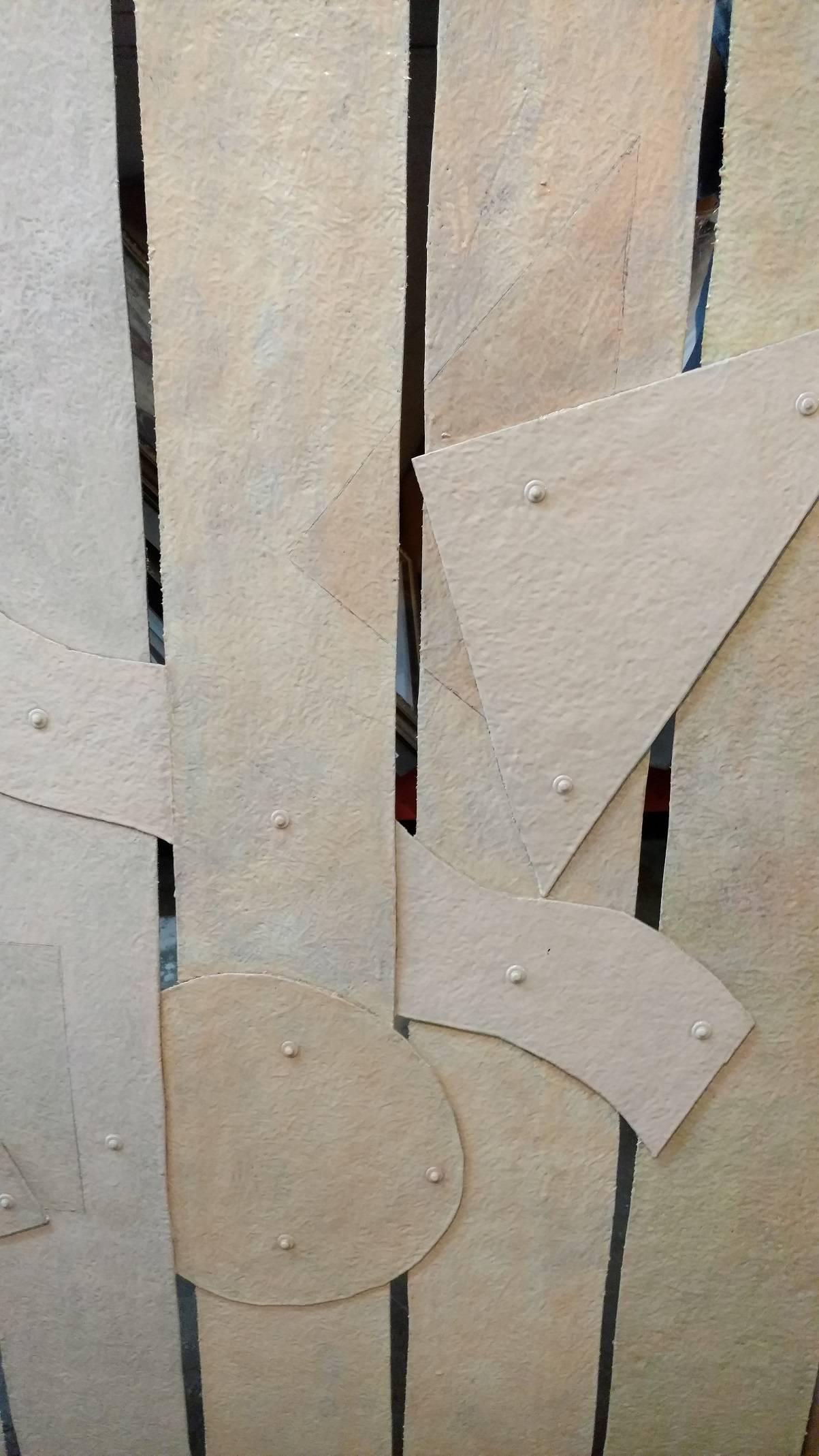 BOLDEN, 1975, acrylic painting on riveted fiberglass strips, titled signed and dated on verso, 57 ½ x 60”

Tom Holland (born 1936 in Seattle, Washington, United States) is an American visual artist. Holland is known for creating a style of art that