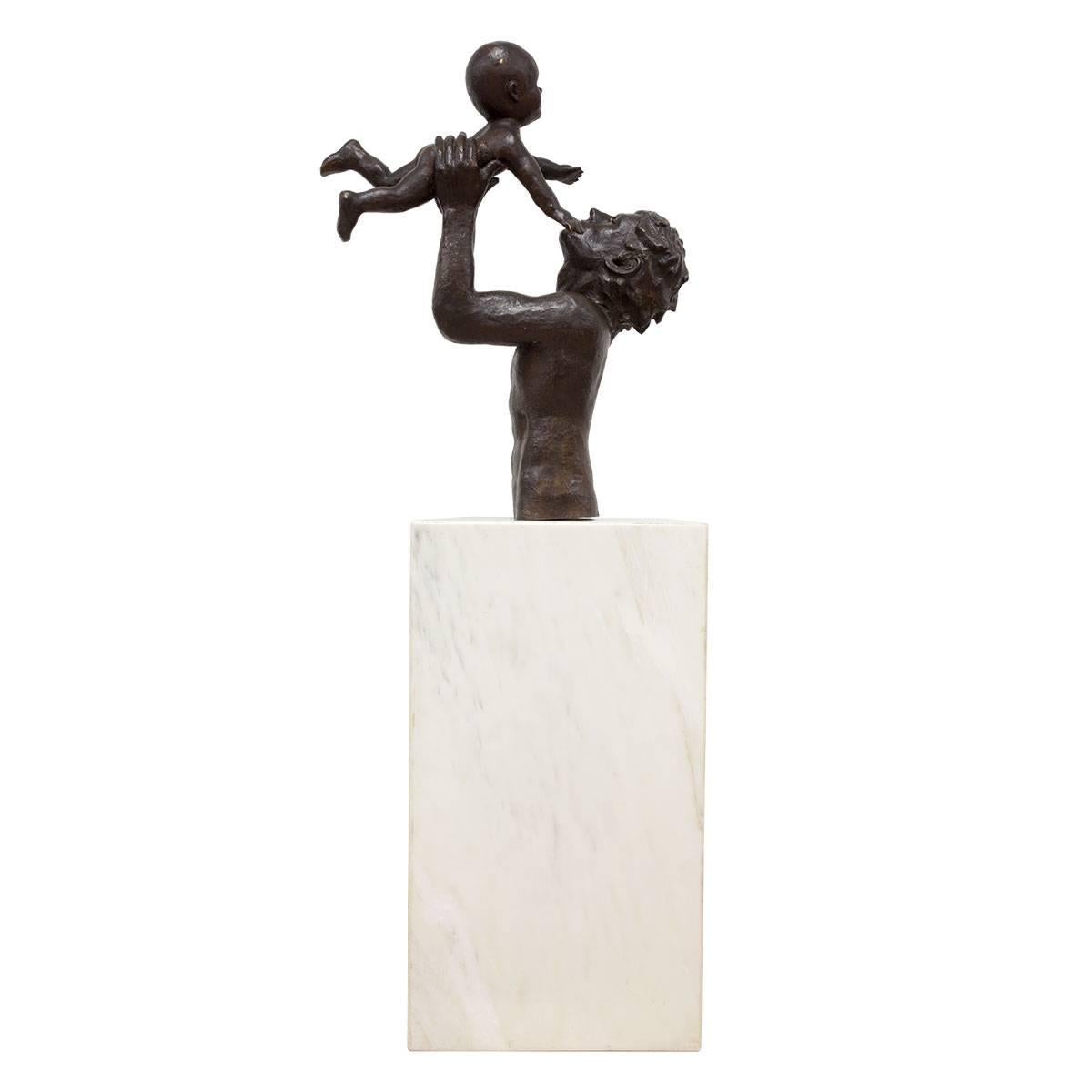 In this sculpture the Mexican artist Victor Salmones renders the image of a father holding a first born child using the lost wax casting method, the sculpture is mounted on a large marble base. 
This sculpture is signed by the artist, and numbered
