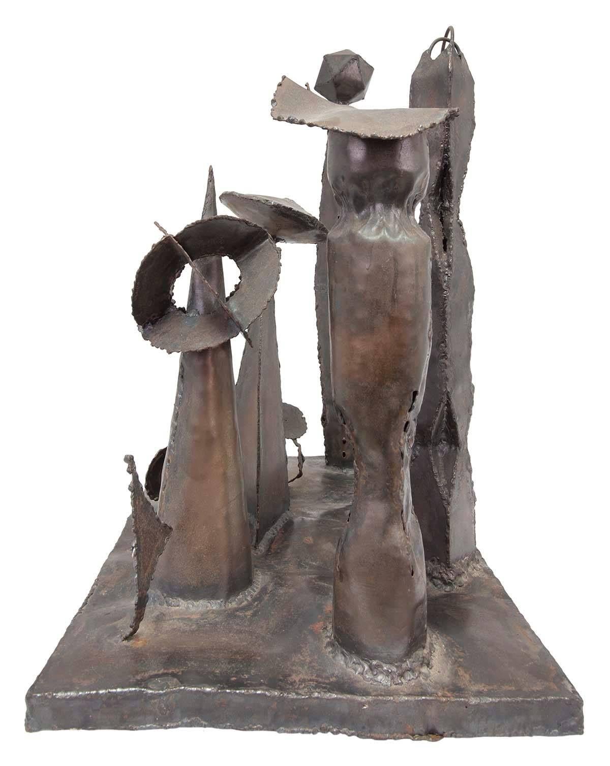 In this bronze sculpture the artist (unknown) has welded together a group of totems or monuments into a unified piece. T
Neo-Dada Abstract Sculpture: Assemblages

In contrast, abstract sculpture followed a slightly different course. Rather than