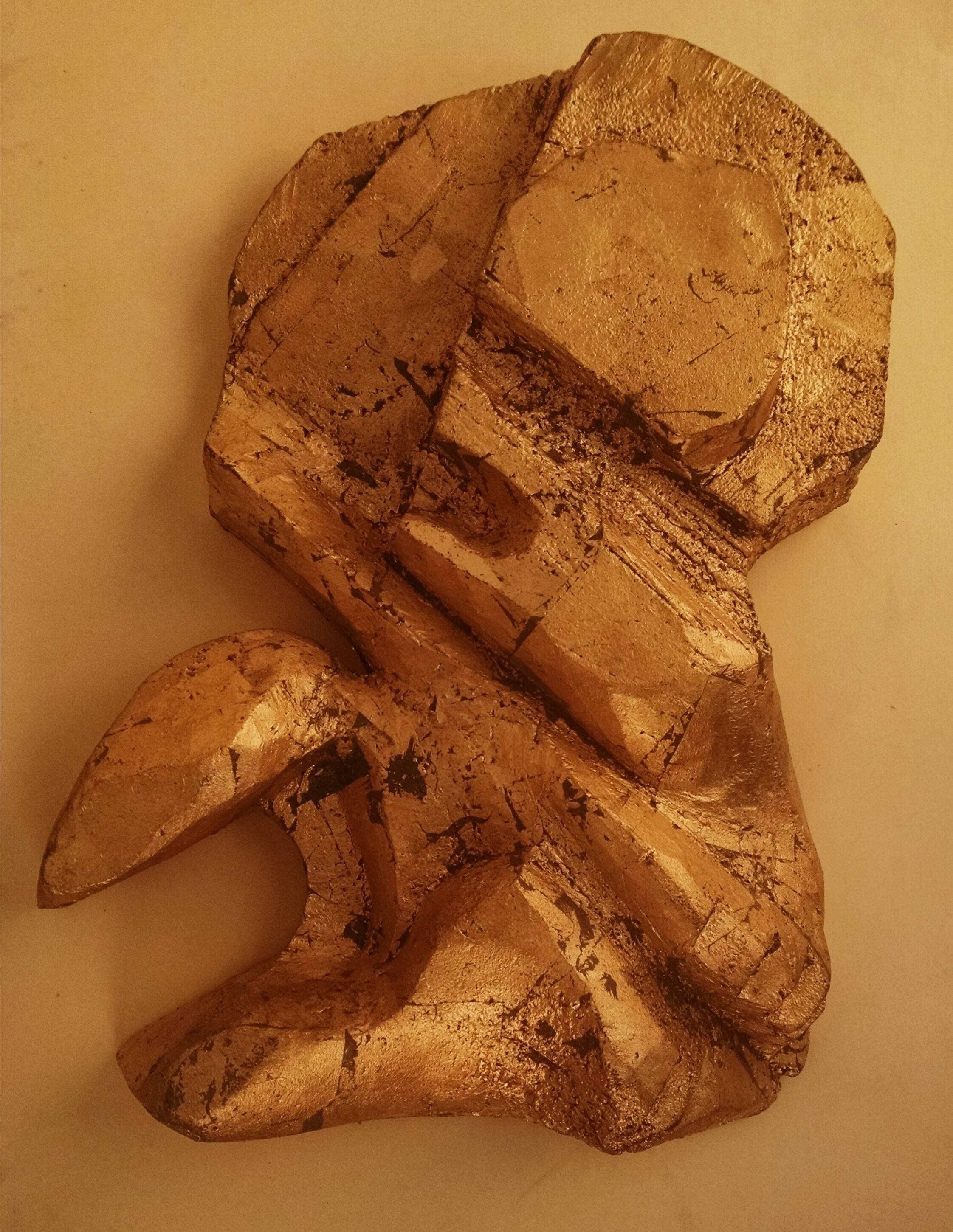 This is a gold finished steel or iron sculpture in an amorphous shape, quite heavy. kind of reminds me of the sculpture of Han Jean Arp. This came from an estate and bears his intitials welded to the verso. there is no accompanying documentation. it