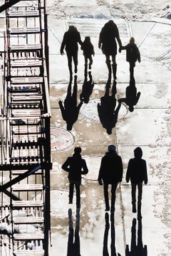 Silhouetted Figures on New York Street