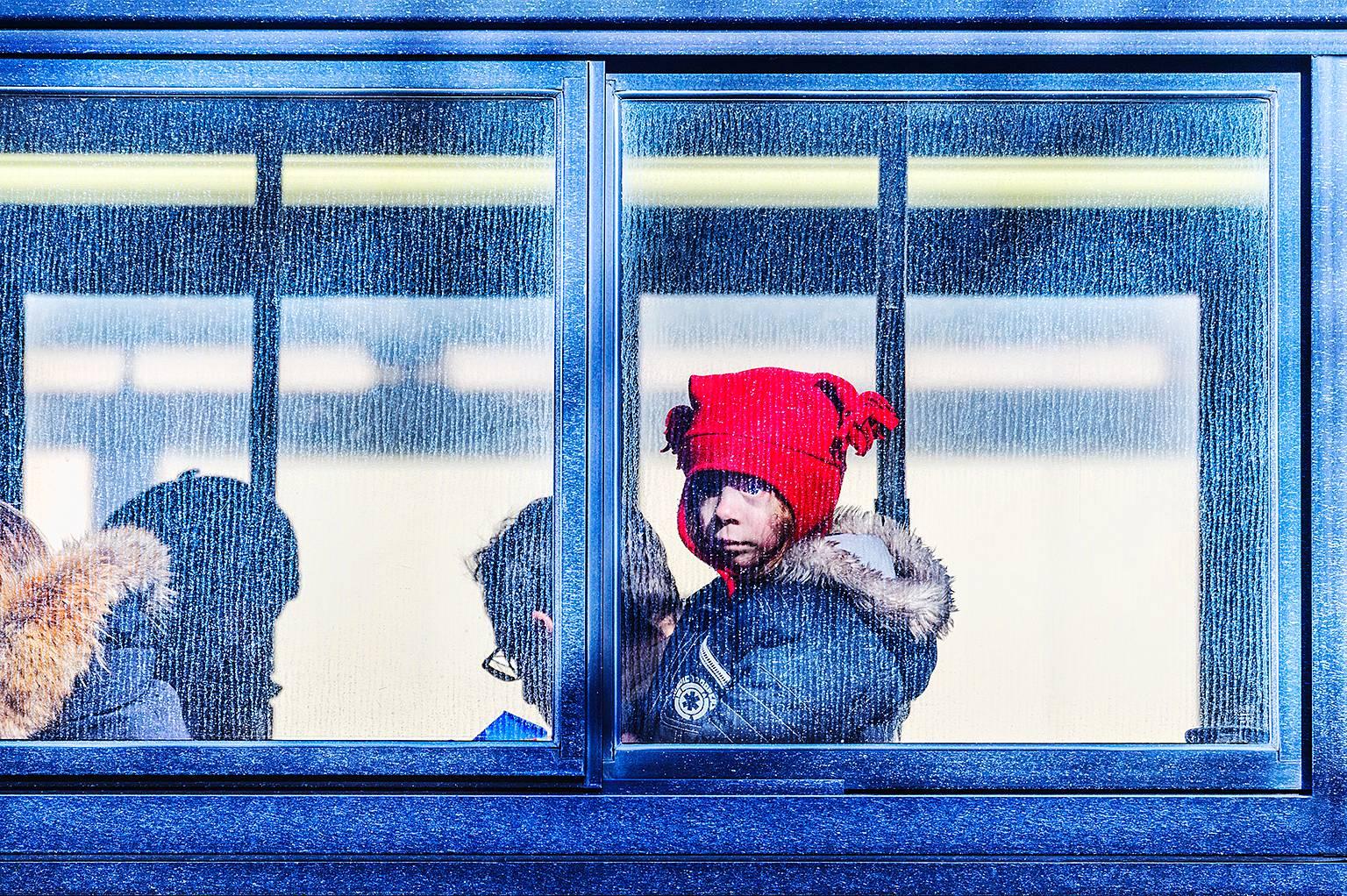 Mitchell Funk Color Photograph - Child on a bus