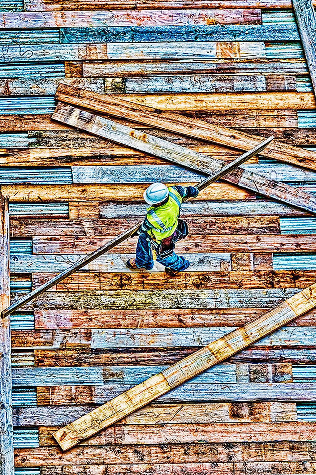 Mitchell Funk Abstract Photograph - Construction Worker on Roof