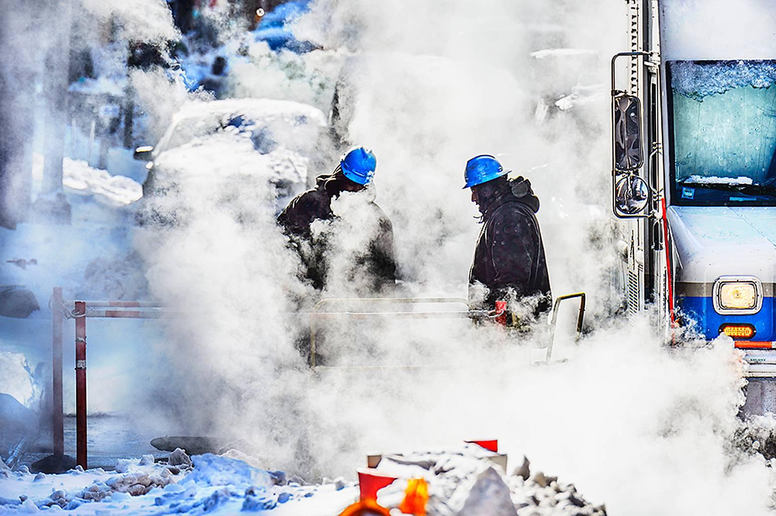 Mitchell Funk Landscape Photograph - Hard Hats in Street Smoke,   New York 