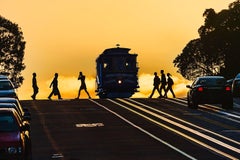 Silhouette d'une voiture à câbles au coucher de soleil à San Francisco 