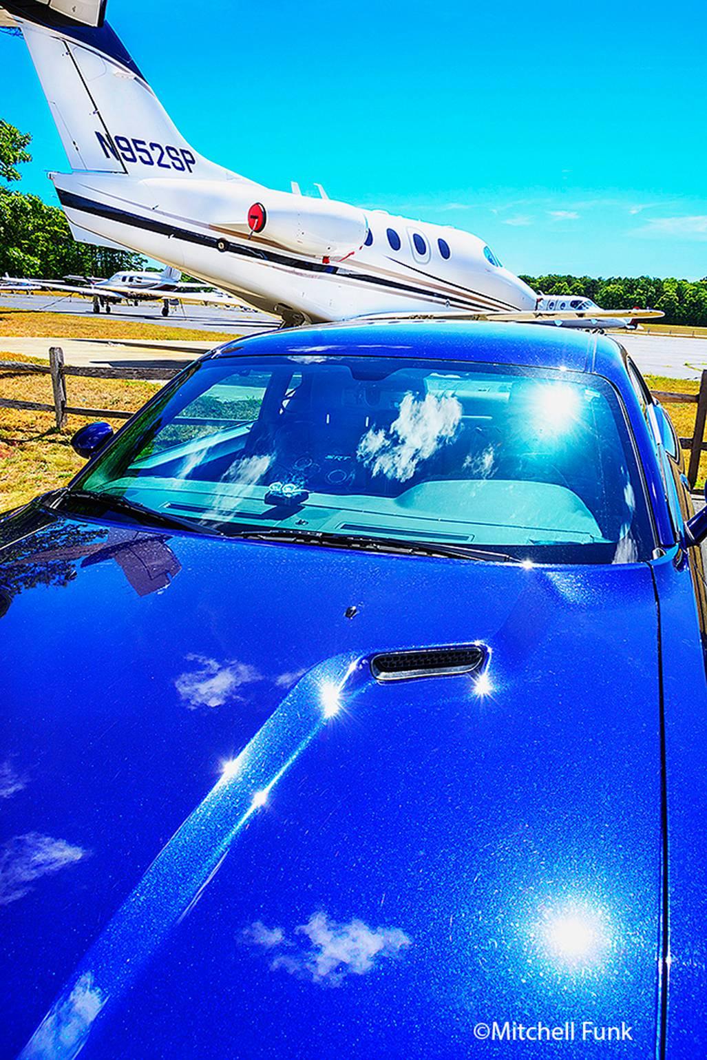 Mitchell Funk Abstract Photograph - Blue Car and Private Jet