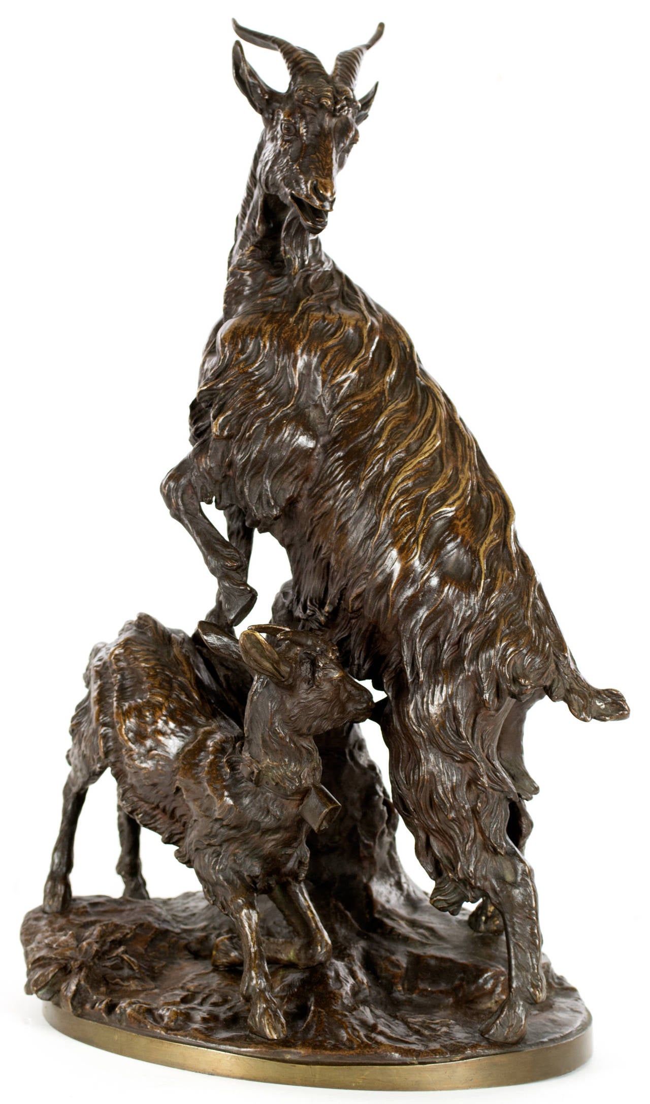 A bronze animalier sculpture of a goat and kid by Emile Pinedo (French, 1840 - 1916) and stamped Tiffany & Co. Pinedo was both sculpted and cast sculptures, often working in collaboration with other artists, including Alphonse Mucha. In the 1890s,