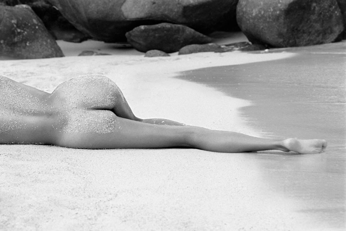 Hugh Arnold Black and White Photograph - Lying There Therese Beach