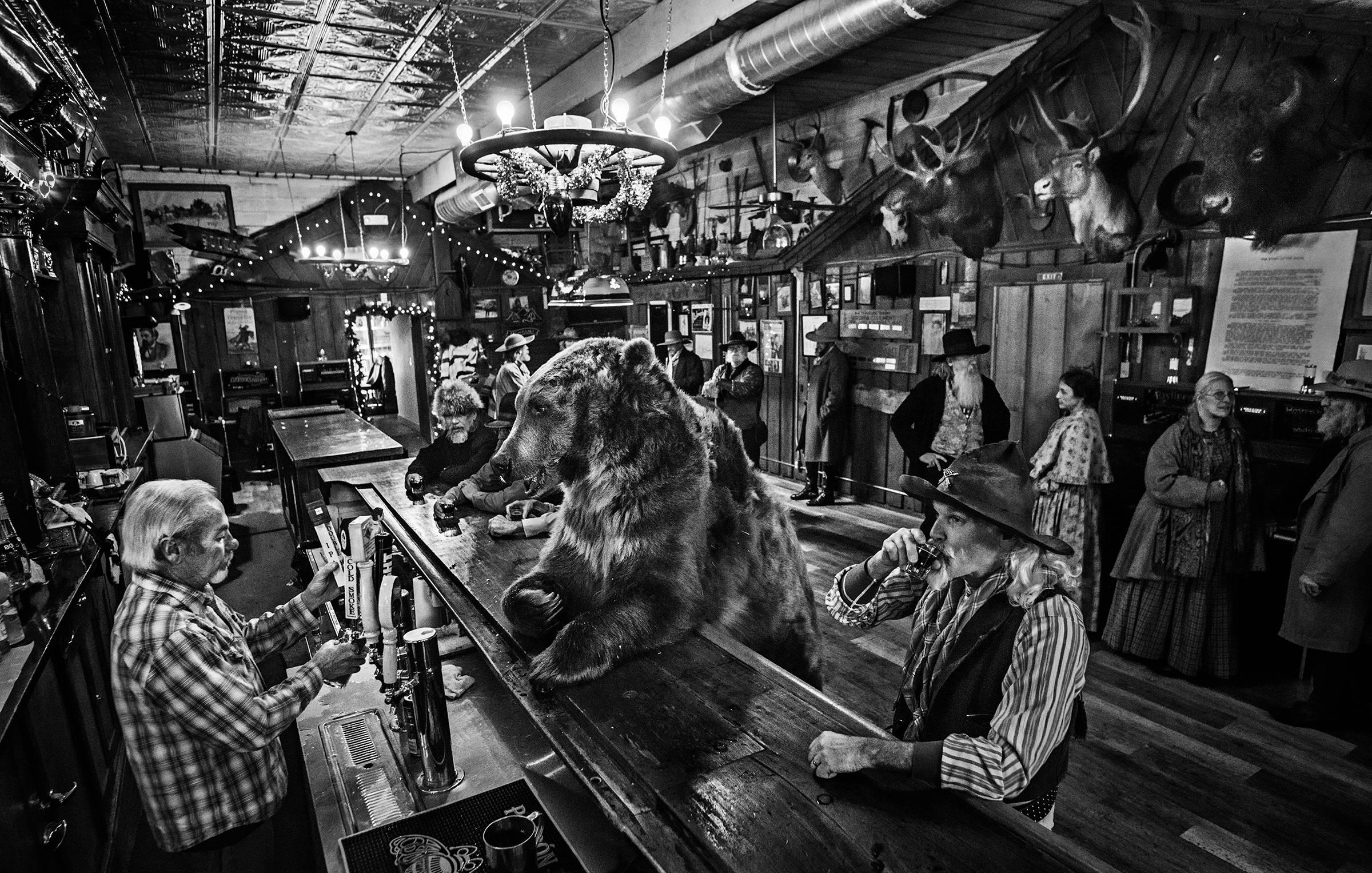 David Yarrow Black and White Photograph - Bear Walks Into A Bar