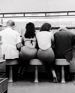 Two Girls in Hollywood at Lee Drugs, 1961 by Julian Wasser