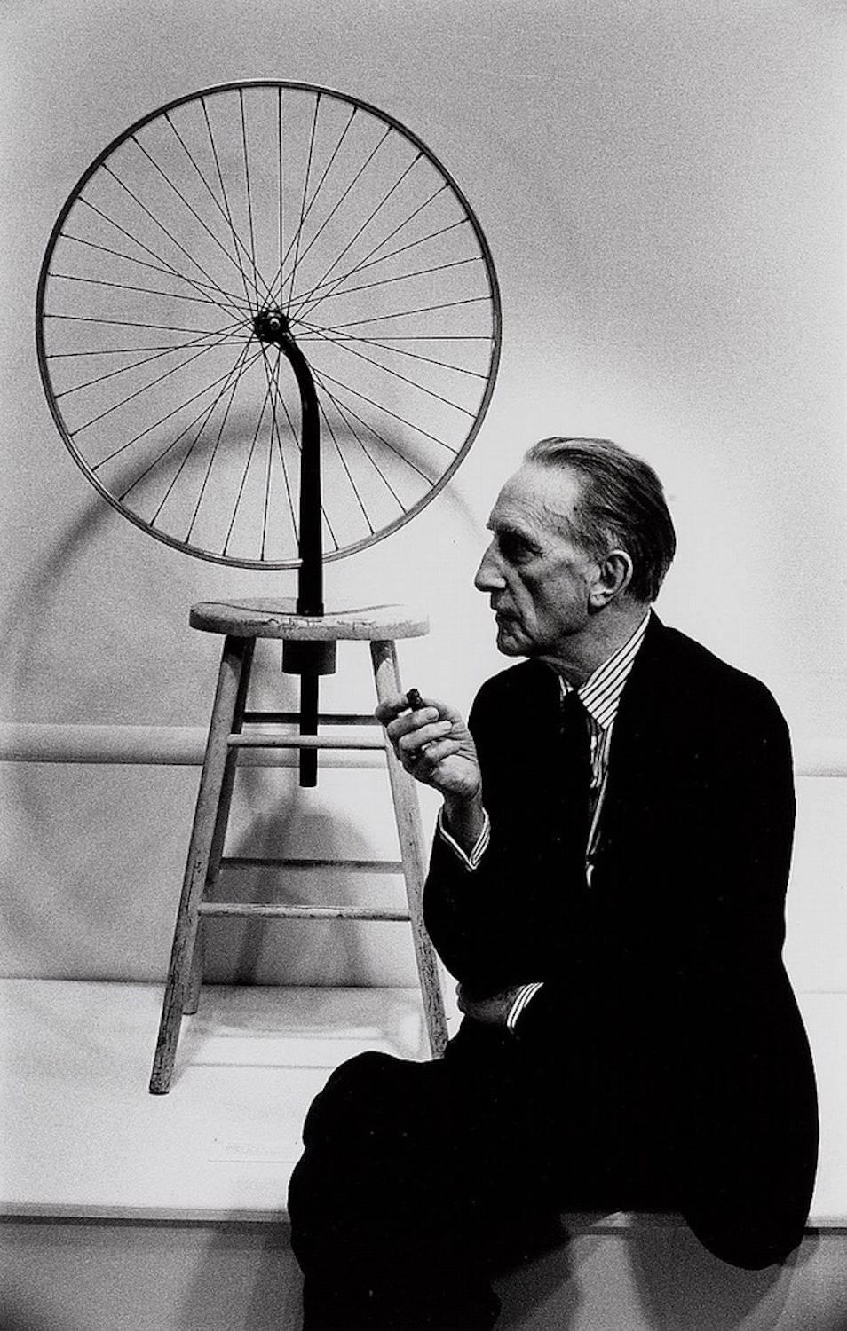 Julian Wasser Portrait Photograph - Marcel Duchamp with his Bicycle Wheel, 1963
