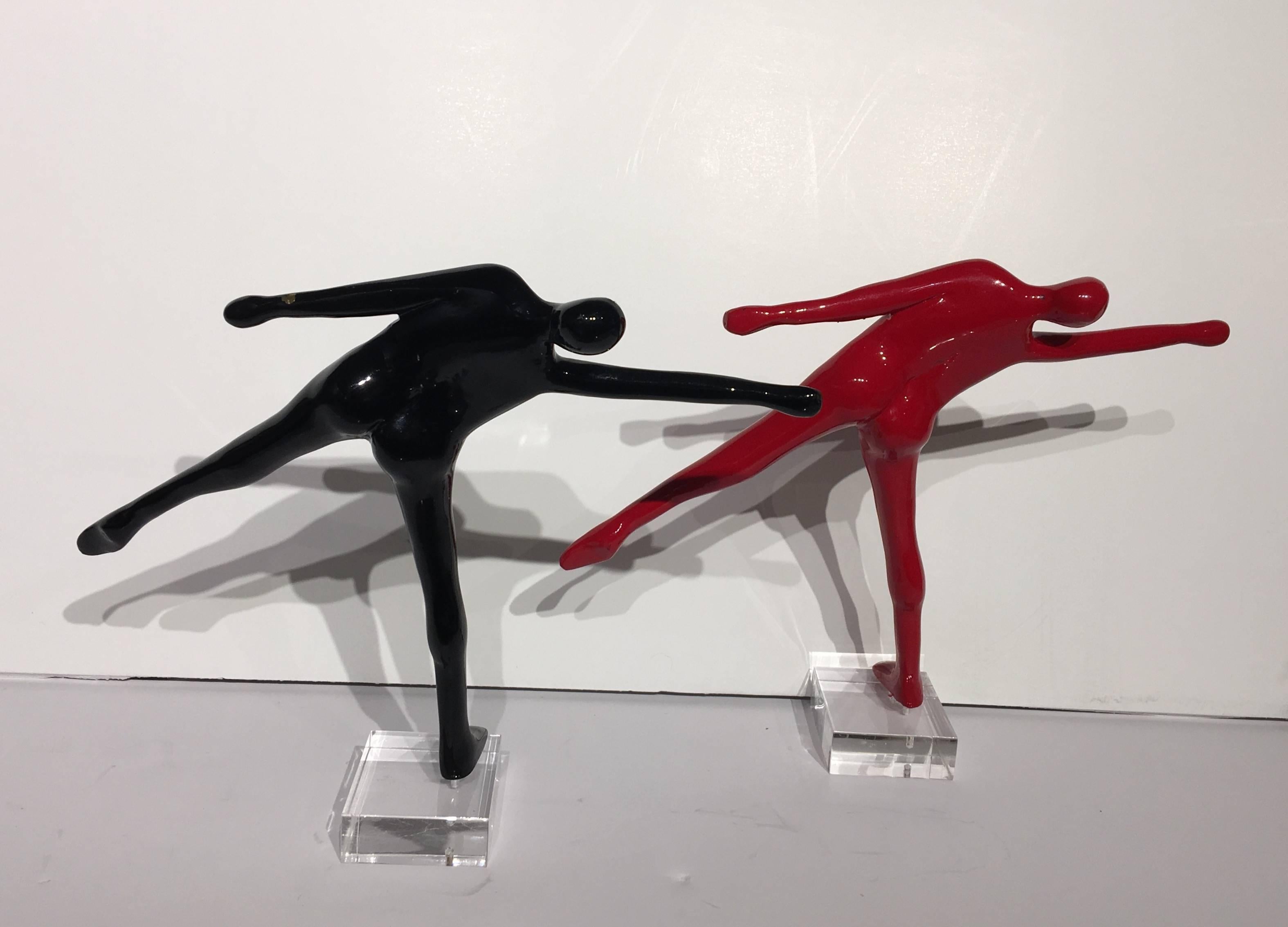 Pair of Bronze sculptures
11 x 7.8 x 2.3 in
28 x 20 x 6 cm

Available in RED & BLACK painted patinas

Born in Thessaloniki, Greece, Kostis Georgiou studied stage scenery in Florence (1981-1982), painting and sculpture in the School of Fine